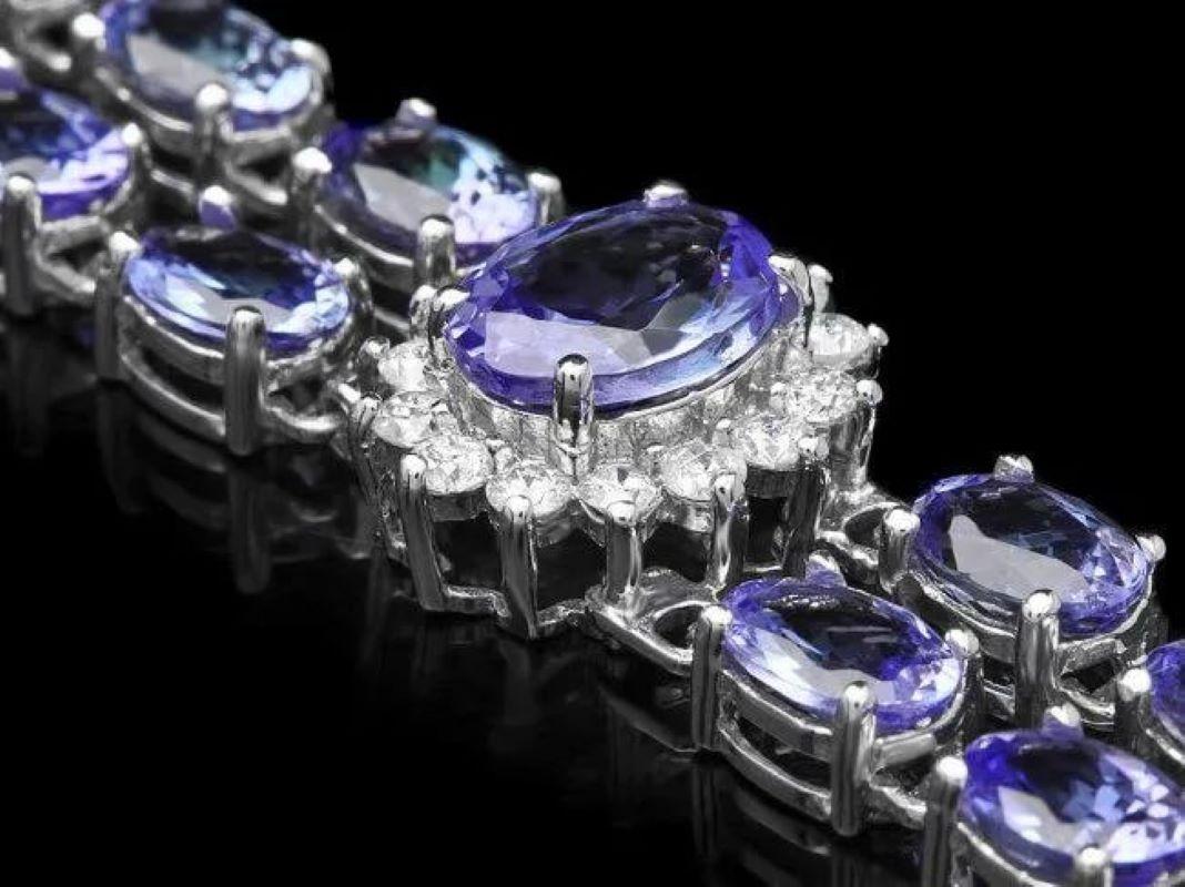 20.00 Carats Natural Tanzanite & Diamond 14K Solid White Gold Bracelet 

Total Natural Tanzanites Weight is: Approx. 18.90 carats 

Tanzanites Measure: 6x4 - 8x6 mm

Total Natural Round Diamonds Weight: Approx. 1.10 Carats (color G-H / Clarity