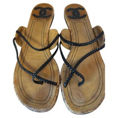 2000s Chanel black and brown sandals in size 38.5 it