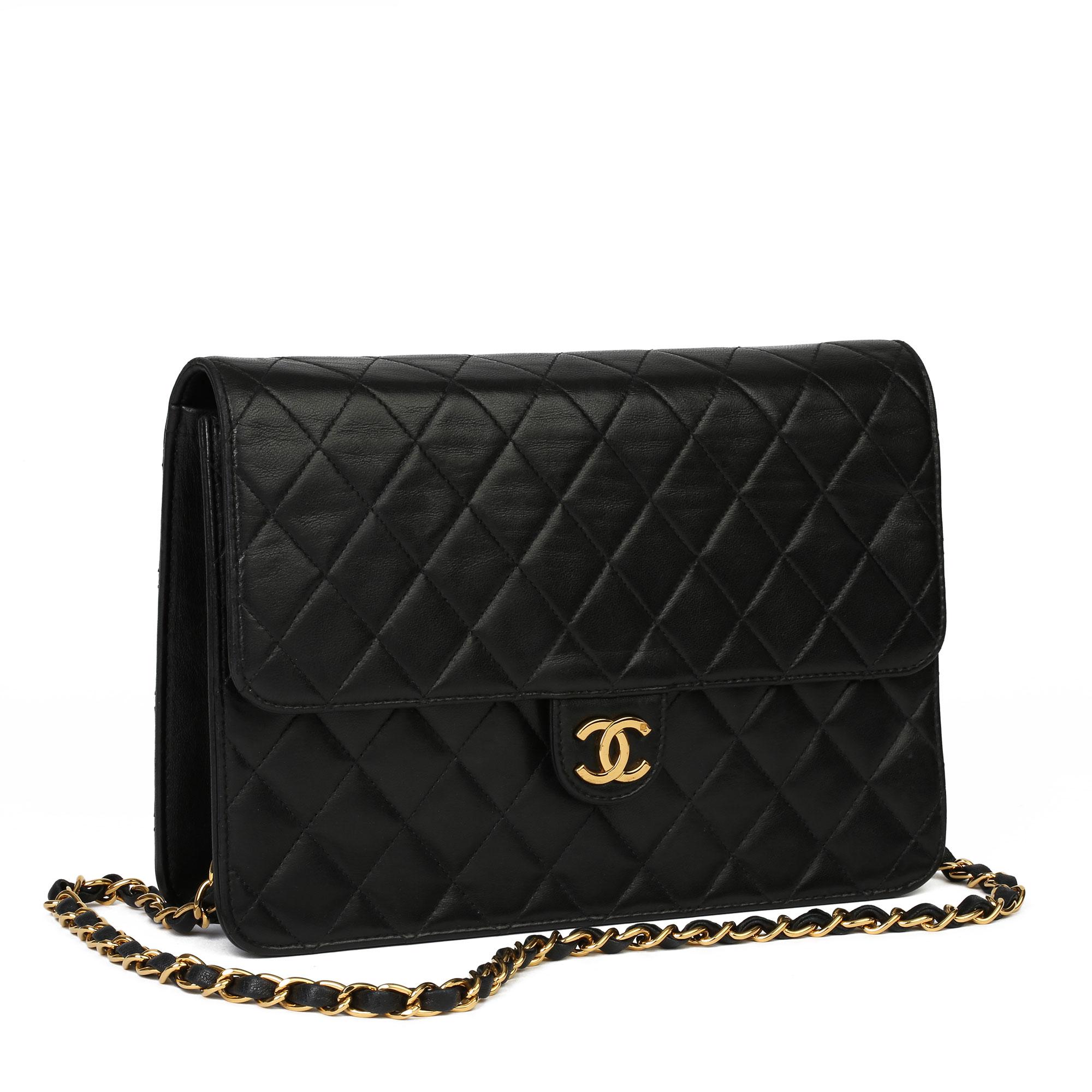 CHANEL
Black Quilted Lambskin Vintage Medium Classic Single Flap Bag 

Xupes Reference: HB3907
Serial Number: 6043495
Age (Circa): 2000
Accompanied By: Care Booklet
Authenticity Details: Serial Sticker (Made in France) 
Gender: Ladies
Type: