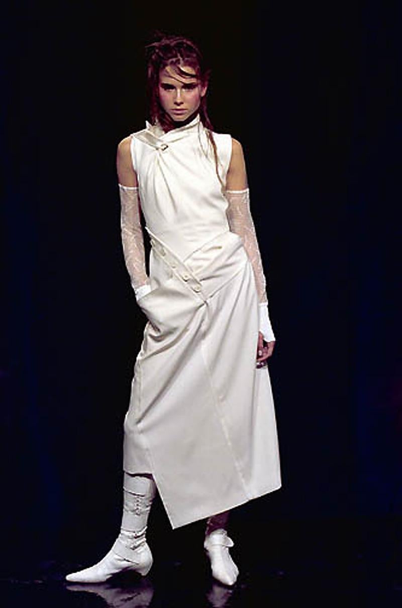 An incredibly gorgeous and well-documented Christian Dior ivory silk crepe asymmetric bias-cut draped dress from John Galliano's highly acclaimed 2000 spring-summer collection. This beautiful piece was runway look #40 and as shown, paired with chic