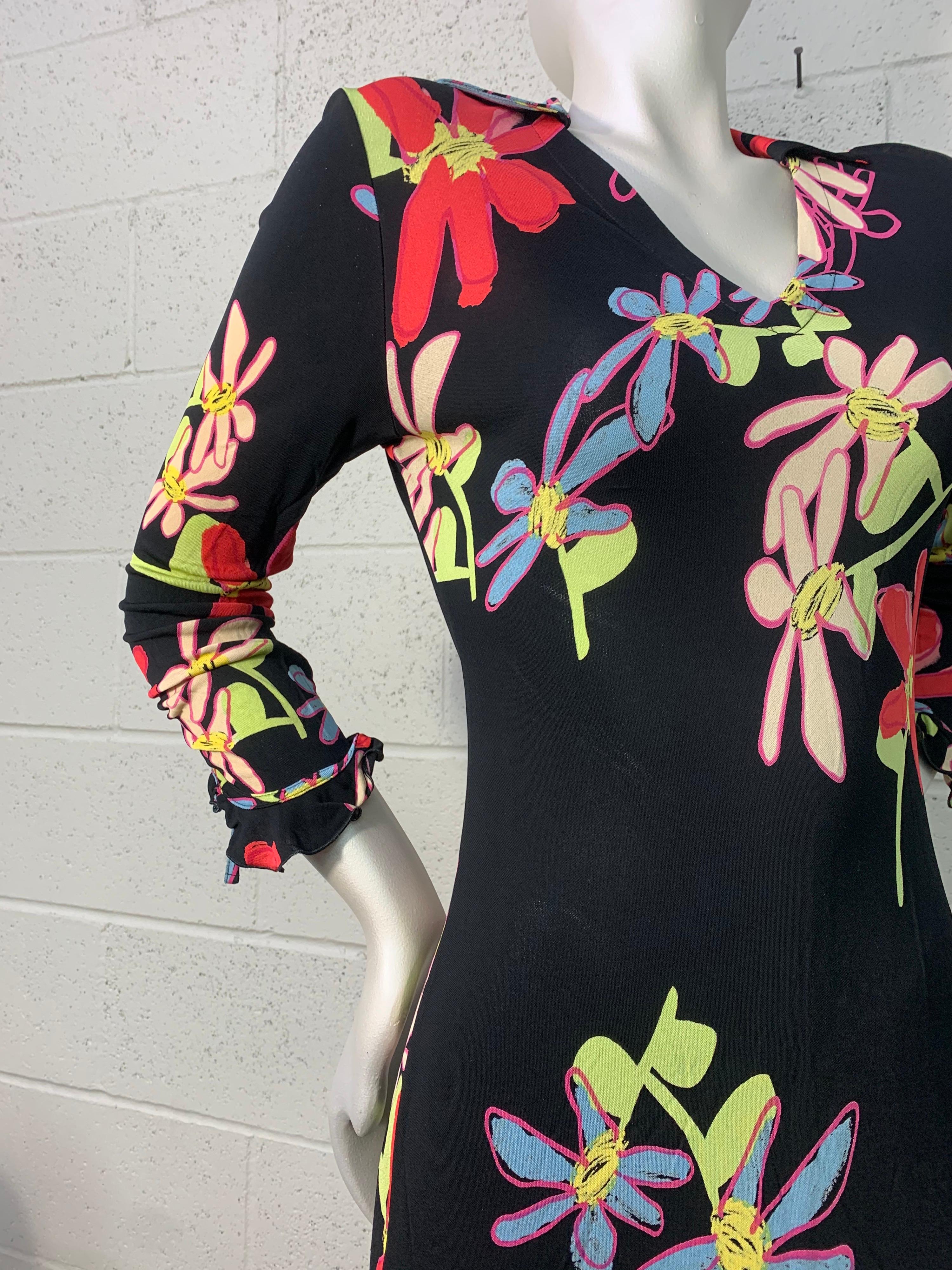 A flirty 2000s Christian Lacroix bias-cut 1930s-inspired rayon jersey dress with stylized floral print: Mid-calf length. Ruffle and tie detail at cuffs. Size EU 44.