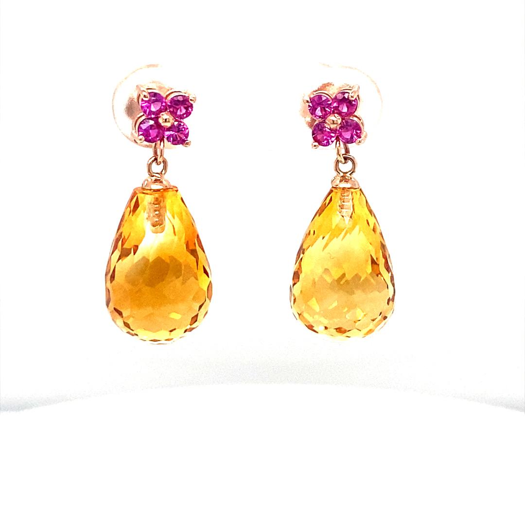 20.00 Citrine Pink Sapphire Rose Gold Drop Earrings

Item Specs:

2 Faceted Briolette Citrine stones weighing approximately 19.55 carats
(Measurements of Citrine Faceted Briolette 15mm x 10mm) 
8 Round Cut Pink Sapphires weighing approximately 0.45