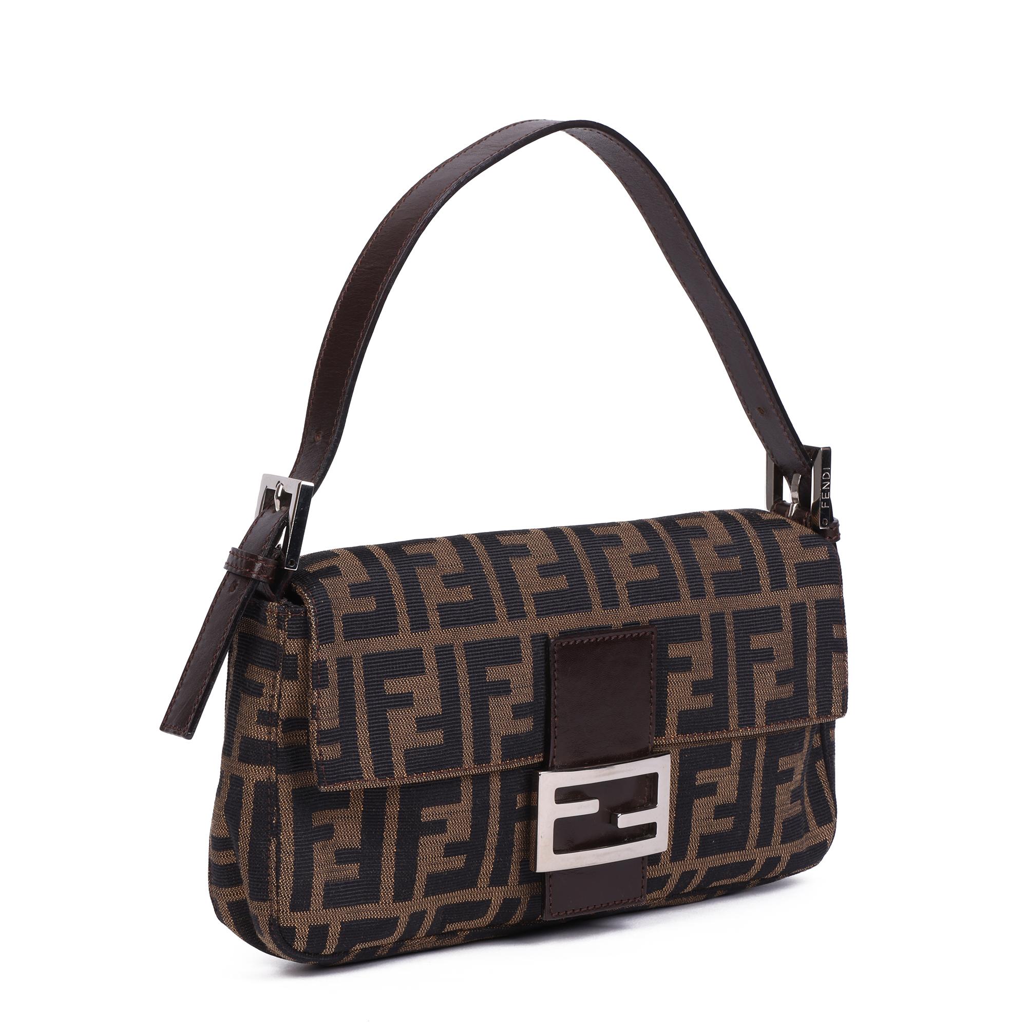 FENDI
Brown Zucca Canvas & Calfskin Leather Vintage Baguette

Xupes Reference: HB4126
Serial Number: Not Present
Age (Circa): 2000
Authenticity Details: Date Stamp (Made in Italy)
Gender: Ladies
Type: Top Handle

Colour: Brown
Hardware: