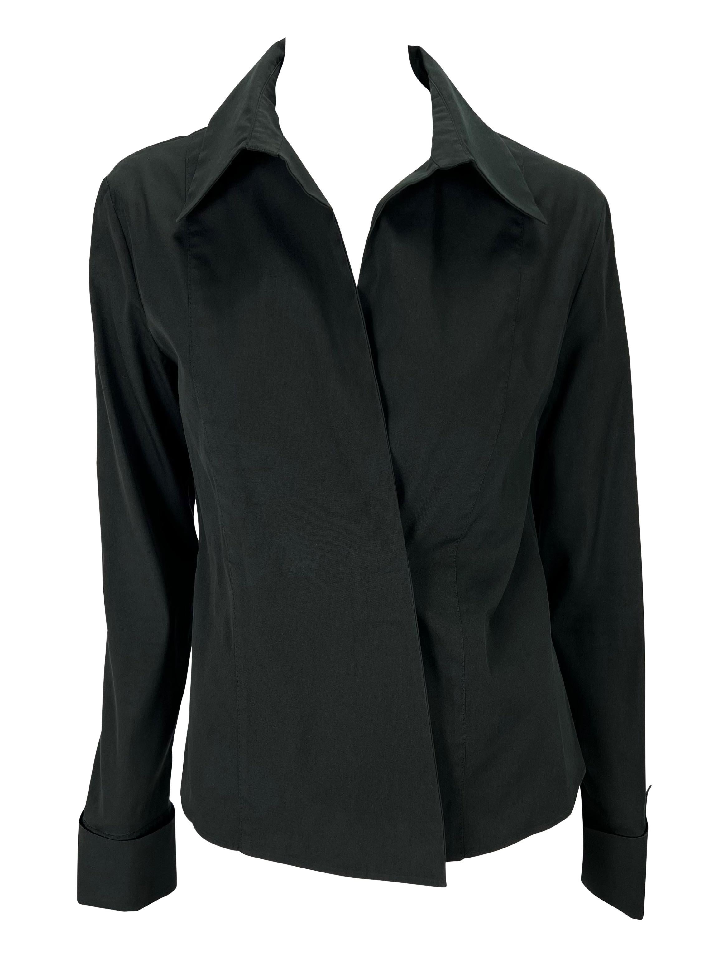 TheRealList presents: a black plunging neckline Gucci shirt, designed by Tom Ford. From 2000, this top features concealed button closures and french cuffs. Add this fabulous vintage Gucci by Tom Ford to your wardrobe! 

Follow us on Instagram!