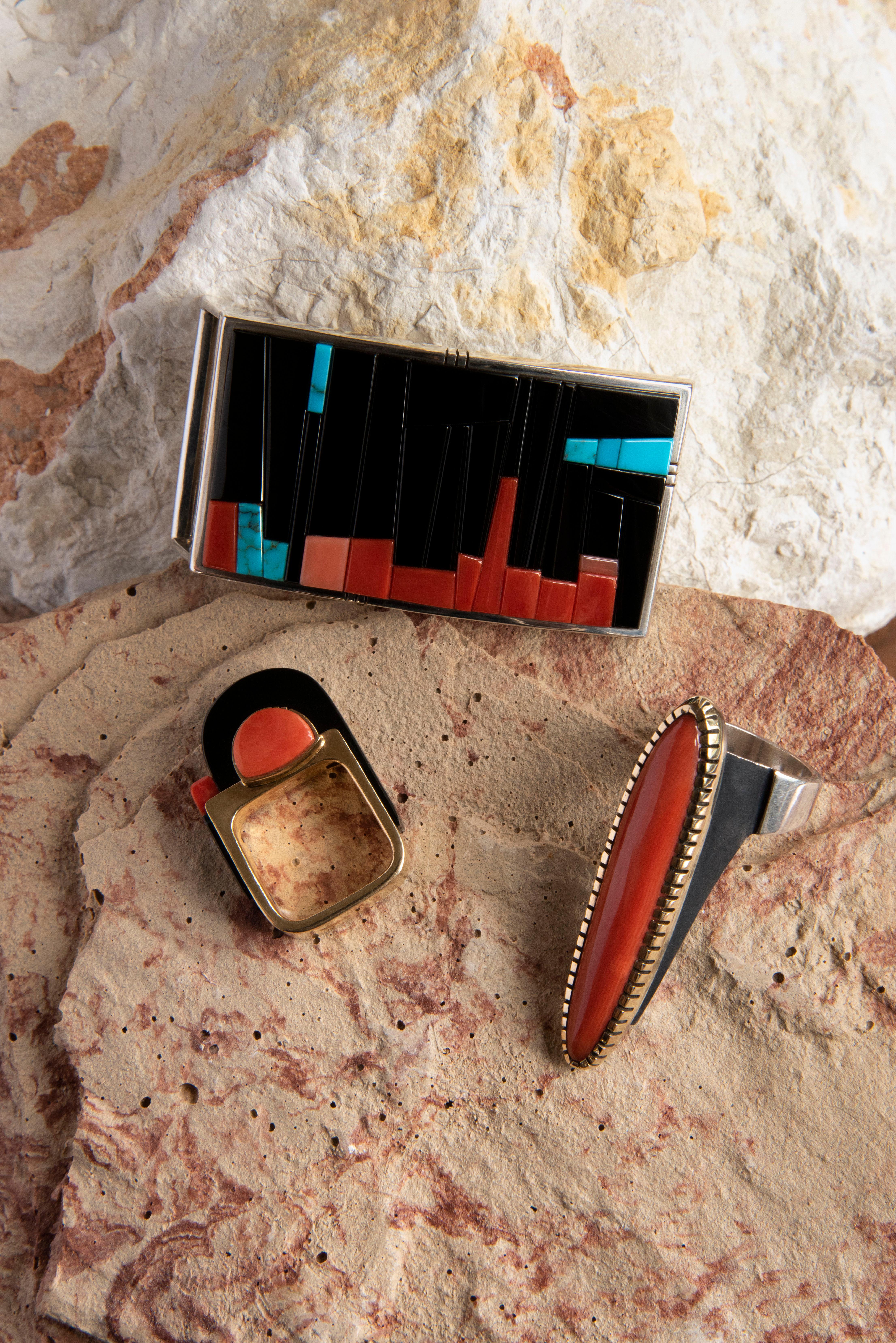 A black jade, coral, turquoise and sterling silver belt buckle, by San Felipe Pueblo master goldsmith & lapidary Richard Chavez, 2000. The belt buckle is stamped with maker's mark for Richard Chavez.