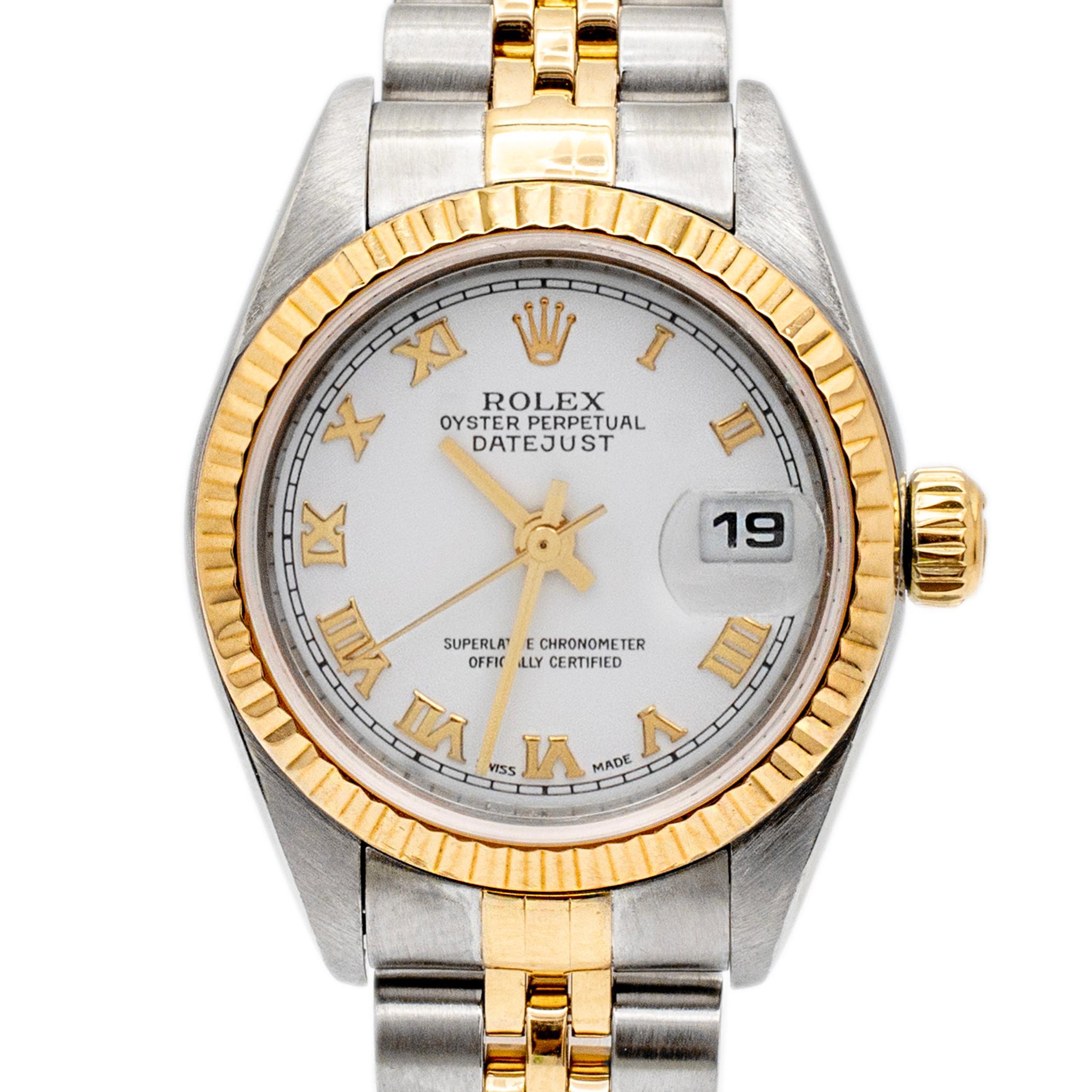 Brand: Rolex

Gender: Ladies

Metal Type: Stainless Steel & Yellow Gold

Diameter: 26.00 mm

Weight: 54.61 grams

Ladies stainless steel and 18K yellow gold ROLEX Swiss made watch with original papers. The metals were tested and determined to be