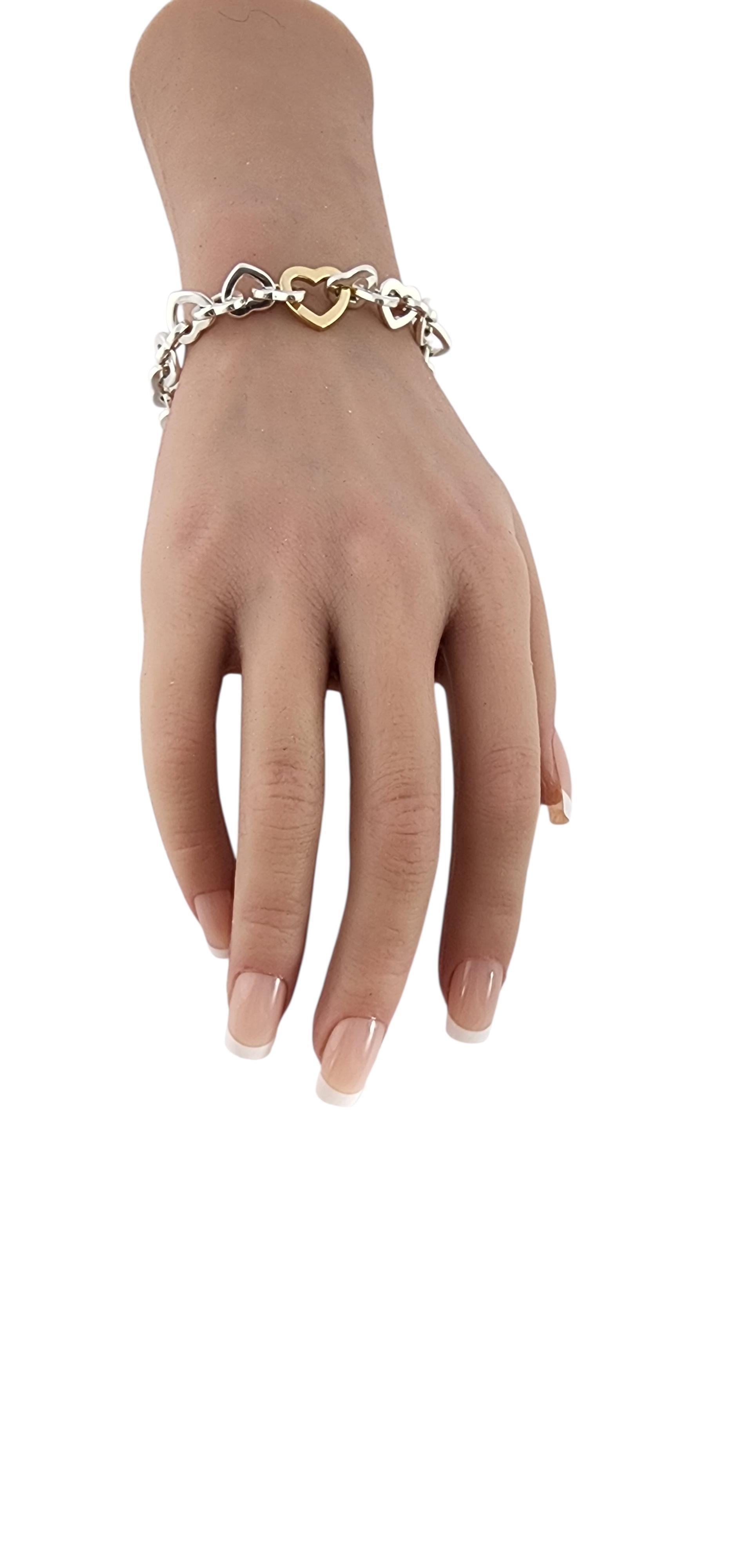 Donna 2000 Tiffany & Co. Sterling 18K Yellow Gold Interlocking Heart Bracelet #24022 in vendita