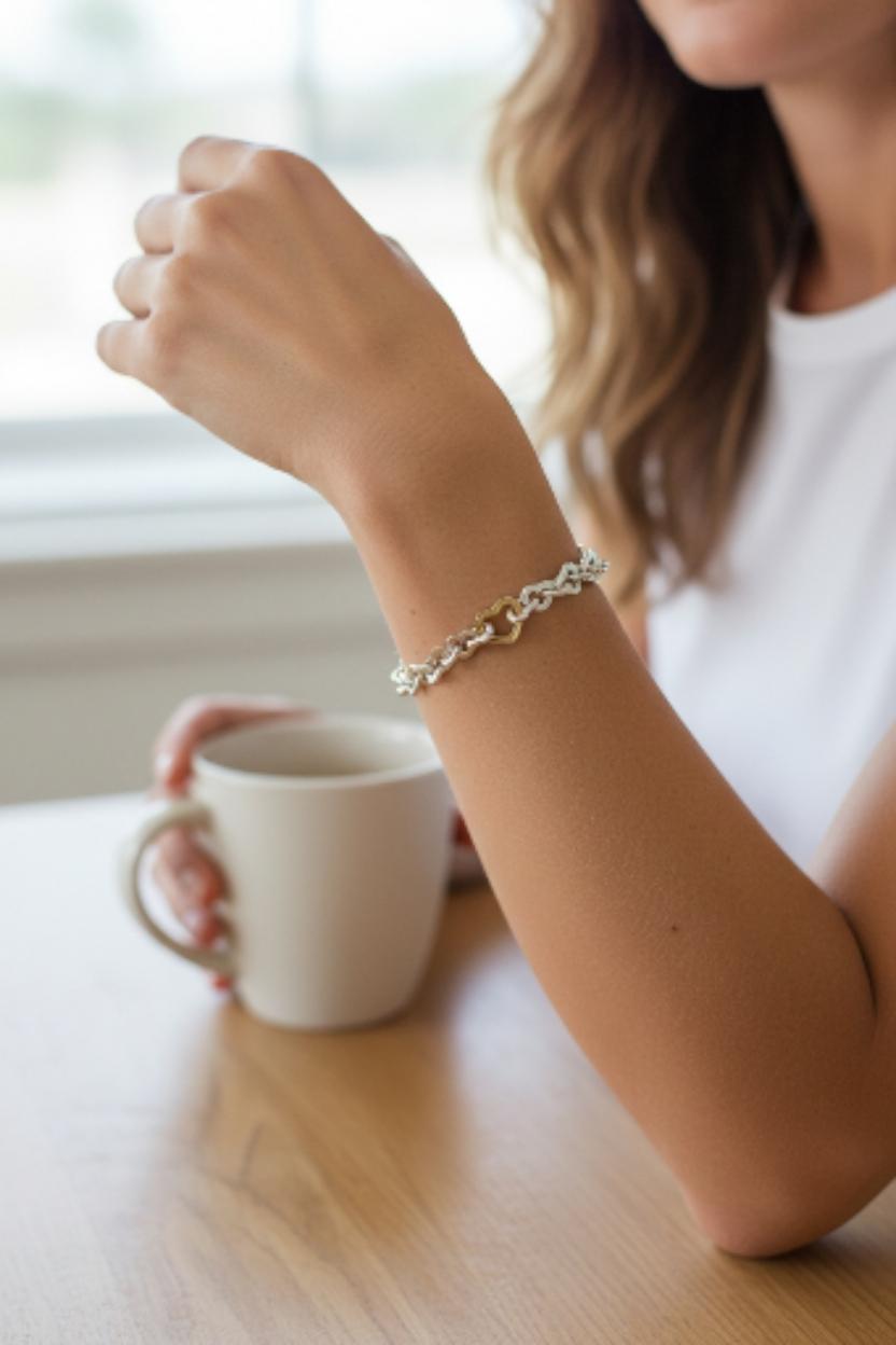 2000 Tiffany & Co. Sterling 18K Yellow Gold Interlocking Heart Bracelet #24022 in vendita 1