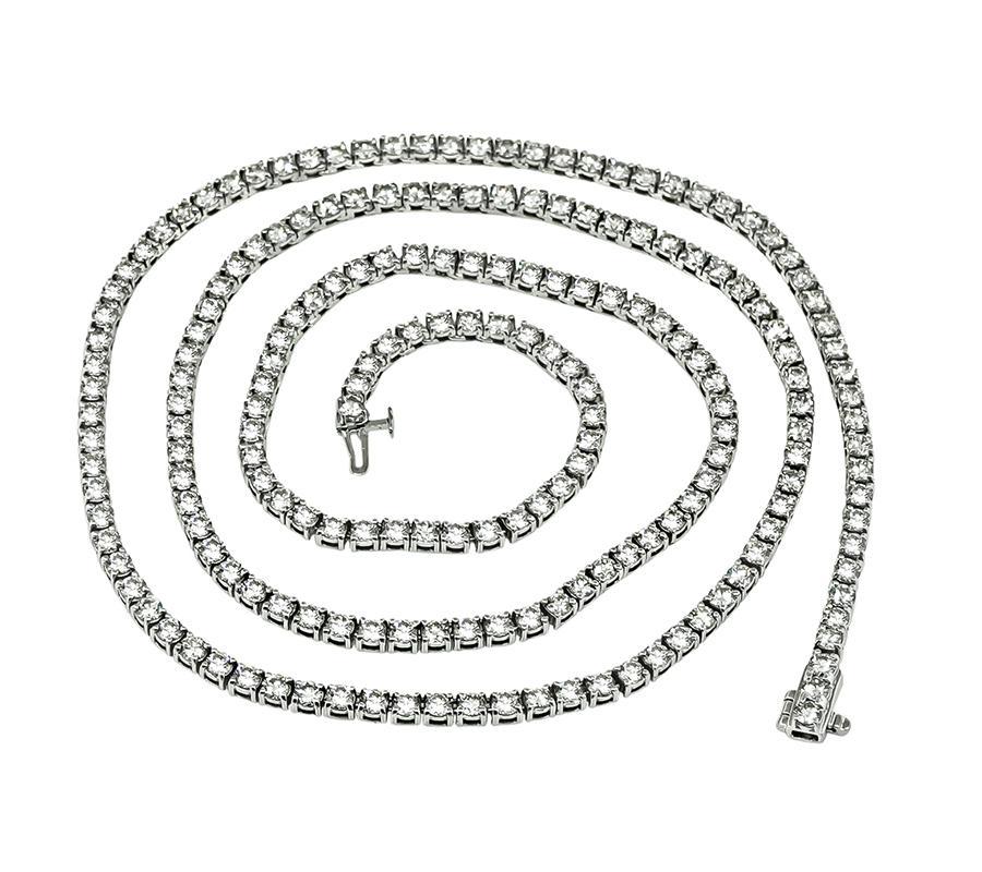 This is a stunning 14k white gold necklace. The necklace is set with sparkling round cut diamonds that weigh approximately 20.00ct. The color of the diamonds is H-I with VS2 clarity. The necklace measures 26 inches in length and 3mm in width. The