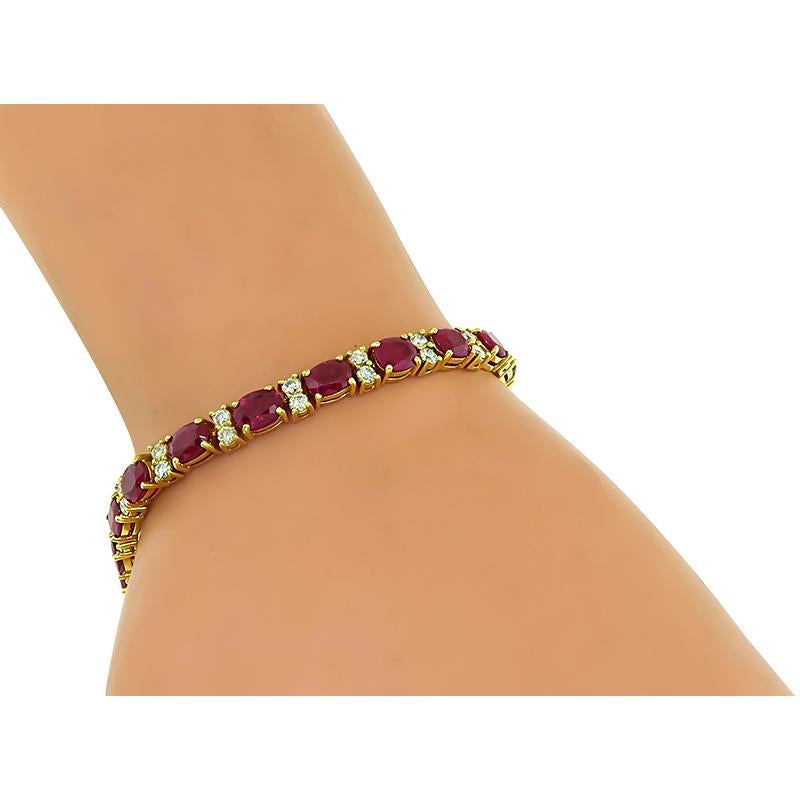 This is a charming 14k yellow gold bracelet and earrings set. The set features lovely oval cut rubies that weigh approximately 20.00ct. The rubies are accentuated by round cut diamonds that weigh approximately 2.50ct. The color of these diamonds is