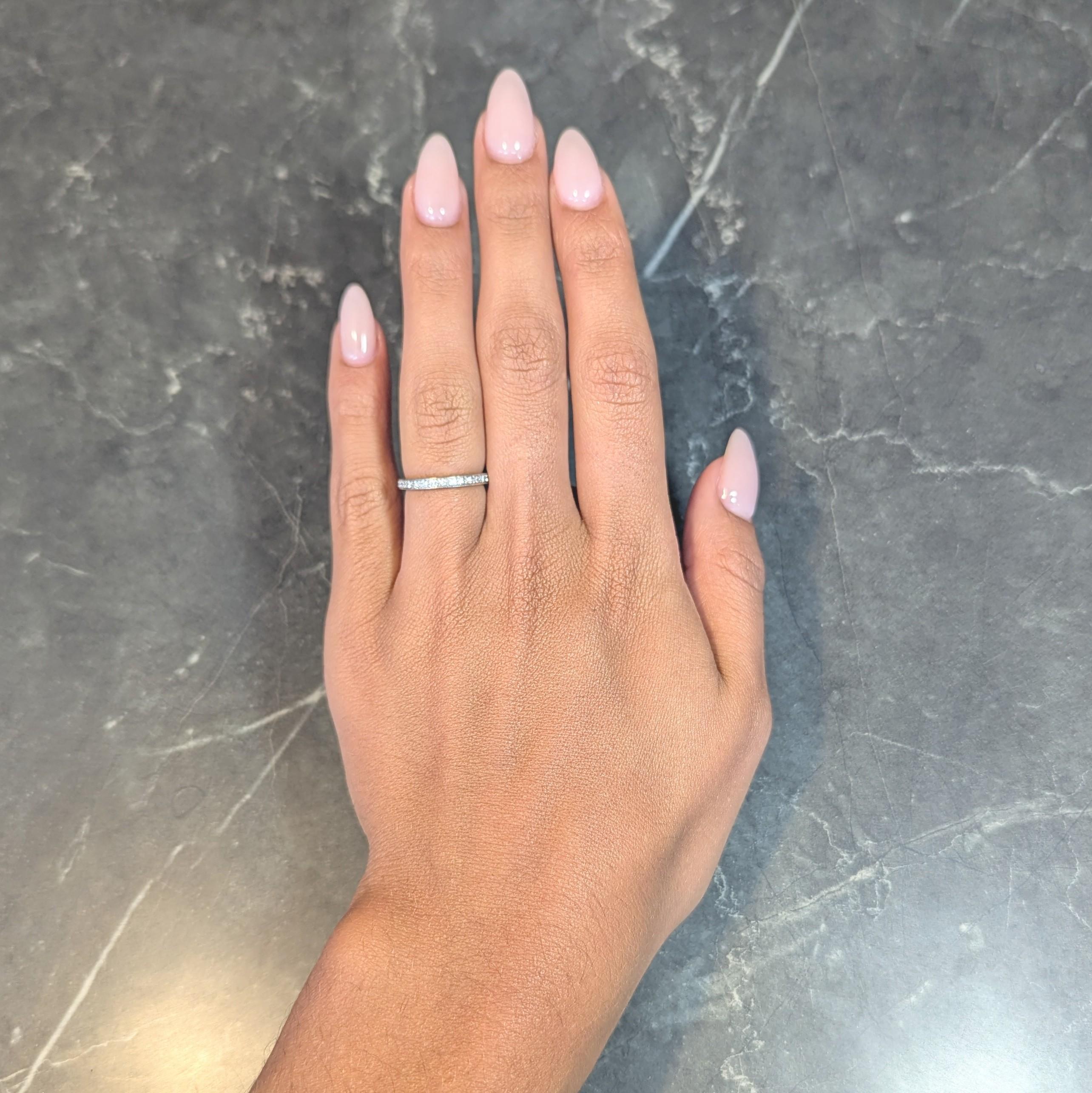 Round Cut 2000's 0.45 CTW Diamond 14 Karat White Gold Eternity Wedding Band Ring For Sale