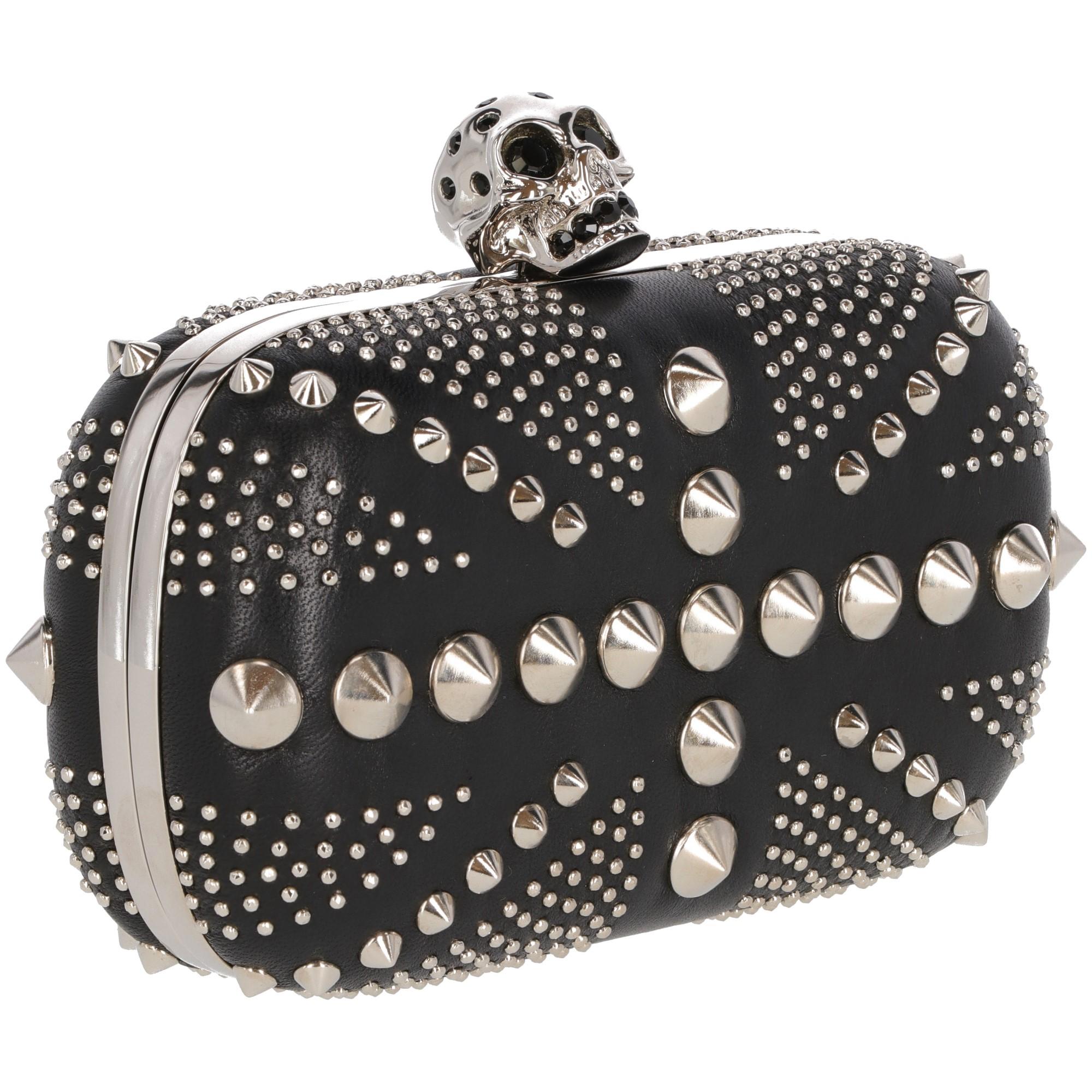 Alexander McQueen studded Union Jack black real leather box clutch with iconic silver-tone metal skull clasp lock with carved logo, embellished with black crystals. Lined in black real leather. 
Embossed code inside: 236715 000926. The clutch comes