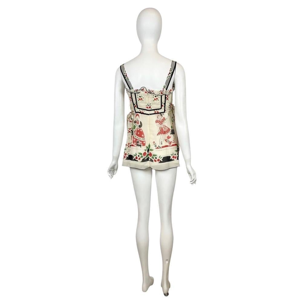 2000s Anna Sui Silk micro mini dress with floral print

Ruffle Embellishment
Zip Closure at Back
100% Silk; Lining 100% Acetate
Bust: 30.75