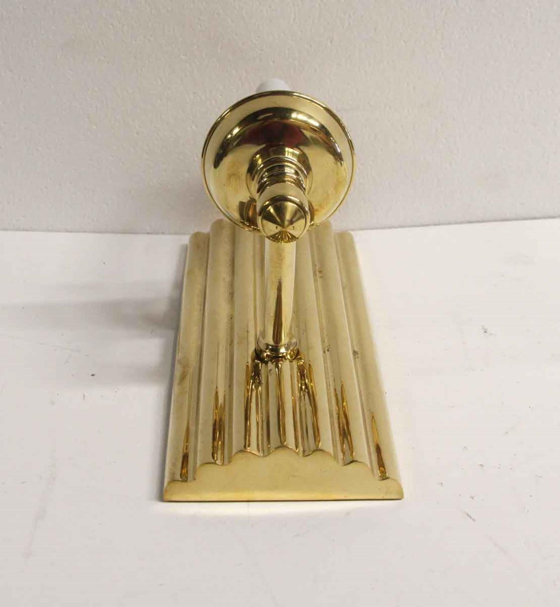 2000s Art Deco Style Cast Brass Single Arm Sconce with Ribbed Backplate In Good Condition In New York, NY