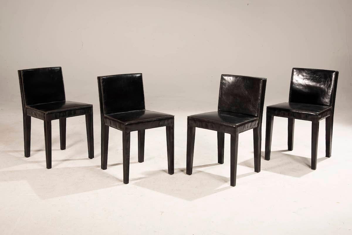 Seat made of black leather for Baxter. Wooden frame, polyurethane padding, soft leather upholstery. 
An attractive chair that offers comfort and design. Thanks to the simplicity and practicality of the design, it is ideal for both domestic and