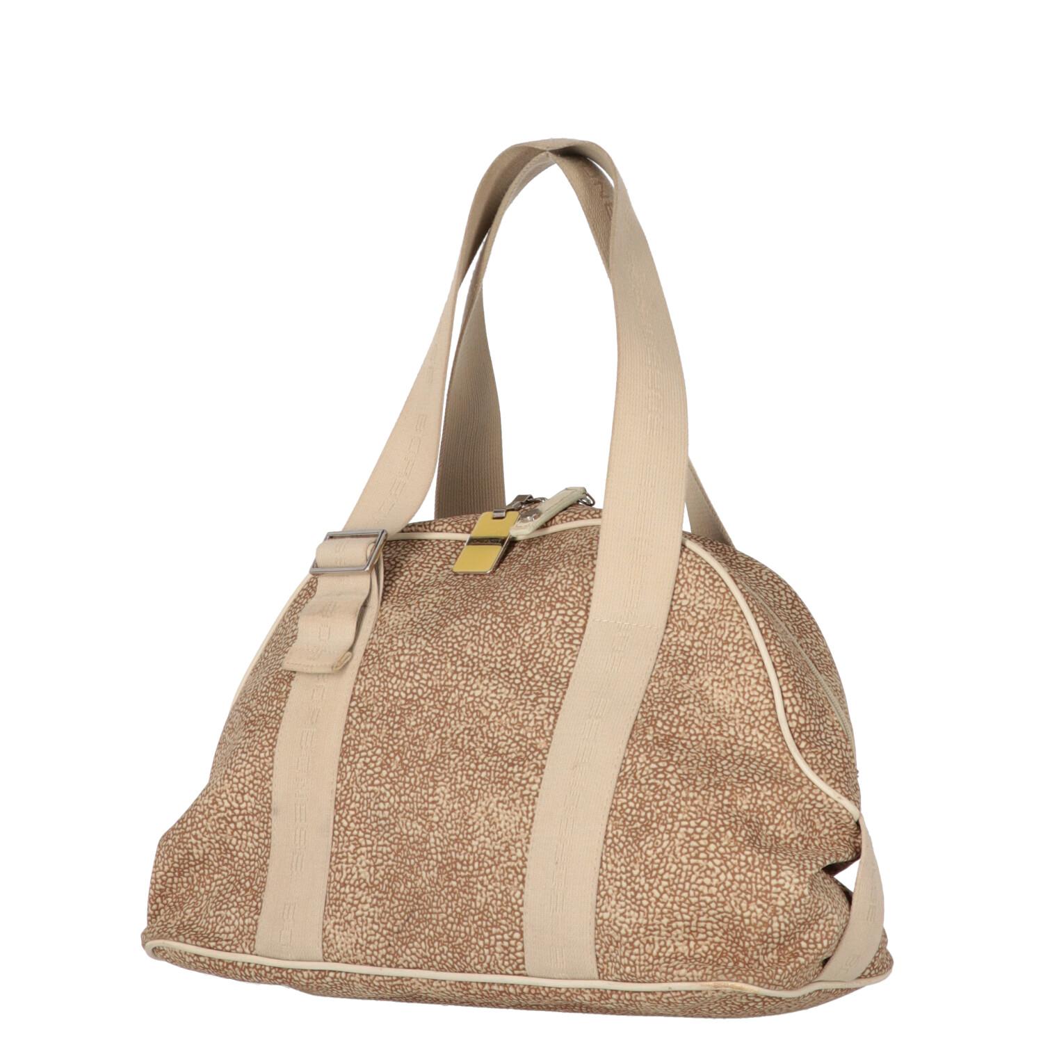 A.N.G.E.L.O. Vintage - ITALY
Borbonese beige fabric with jet op print half-moon bag and edges finished in leather. Logoed cotton ribbon handles with self-locking buckle, double-slider zip closure.

The product shows slight signs of wear on the edges