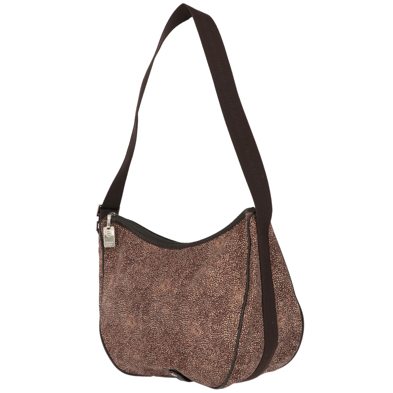 A.N.G.E.L.O. Vintage - ITALY
Borbonese brown fabric with jet op print Luna bag and edges finished in leather. Logoed cotton ribbon shoulder strap with self-locking buckle, zip closure and metal tie road. Inside there are two zipped cosmetic