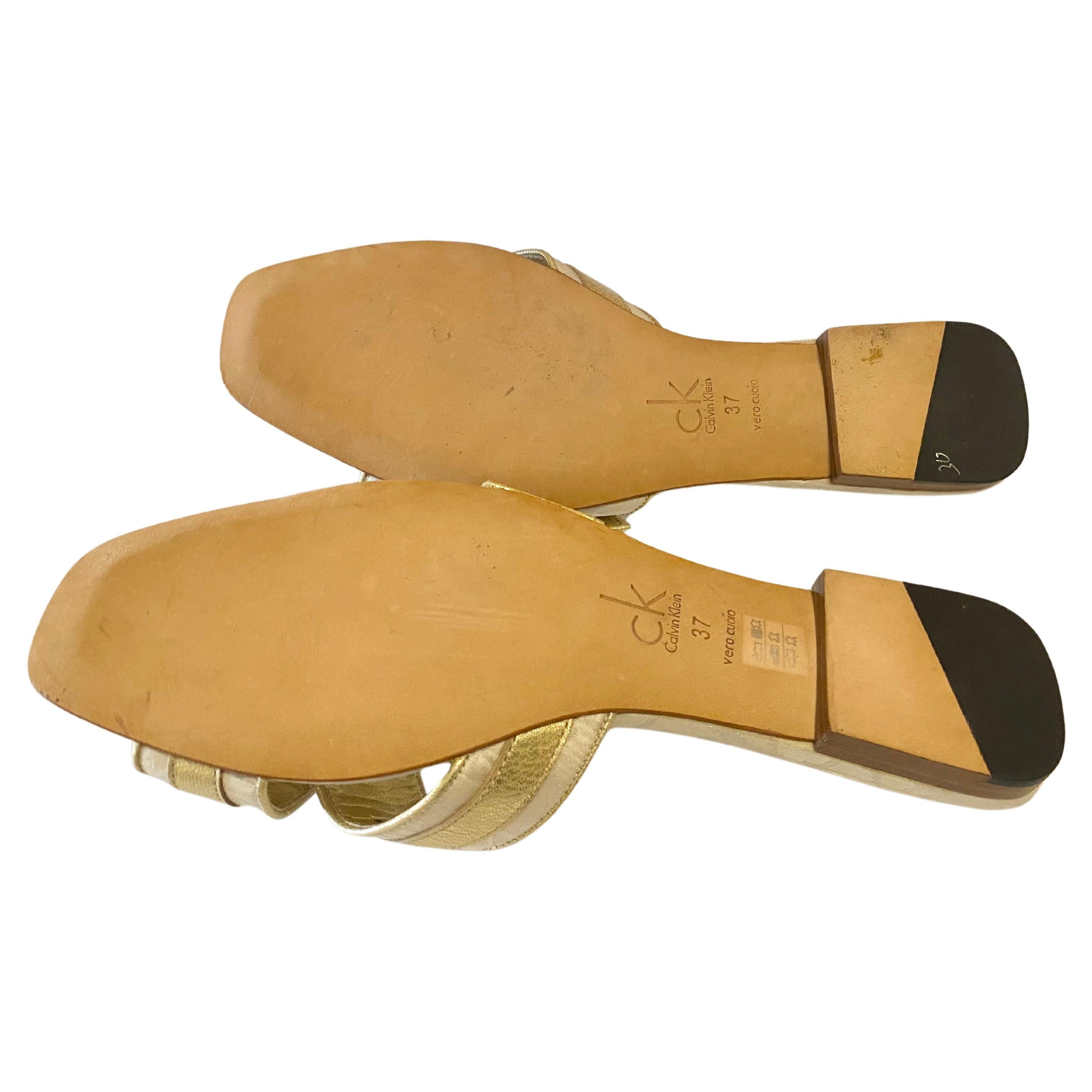 Women's 2000s Calvin Klein Gold Cross Double Strap Flat Sandals For Sale