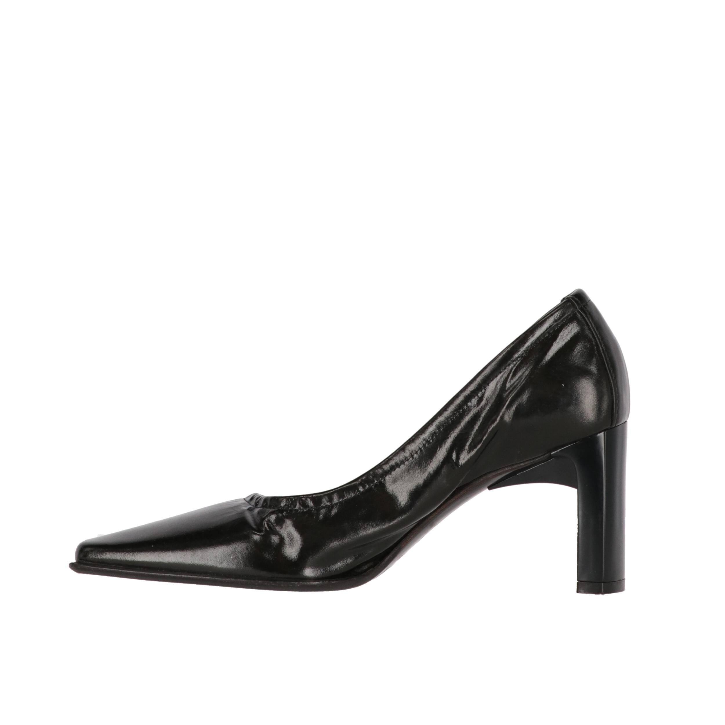 Casadei black patent leather shoes, square toe and sculpture heel.

The product shows slight signs of wear on the leather as shown in the pictures.
Years: 2000s

Made in Italy

Size: 8 UK

Heels: 7,5 cm 
Length insole: 27 cm