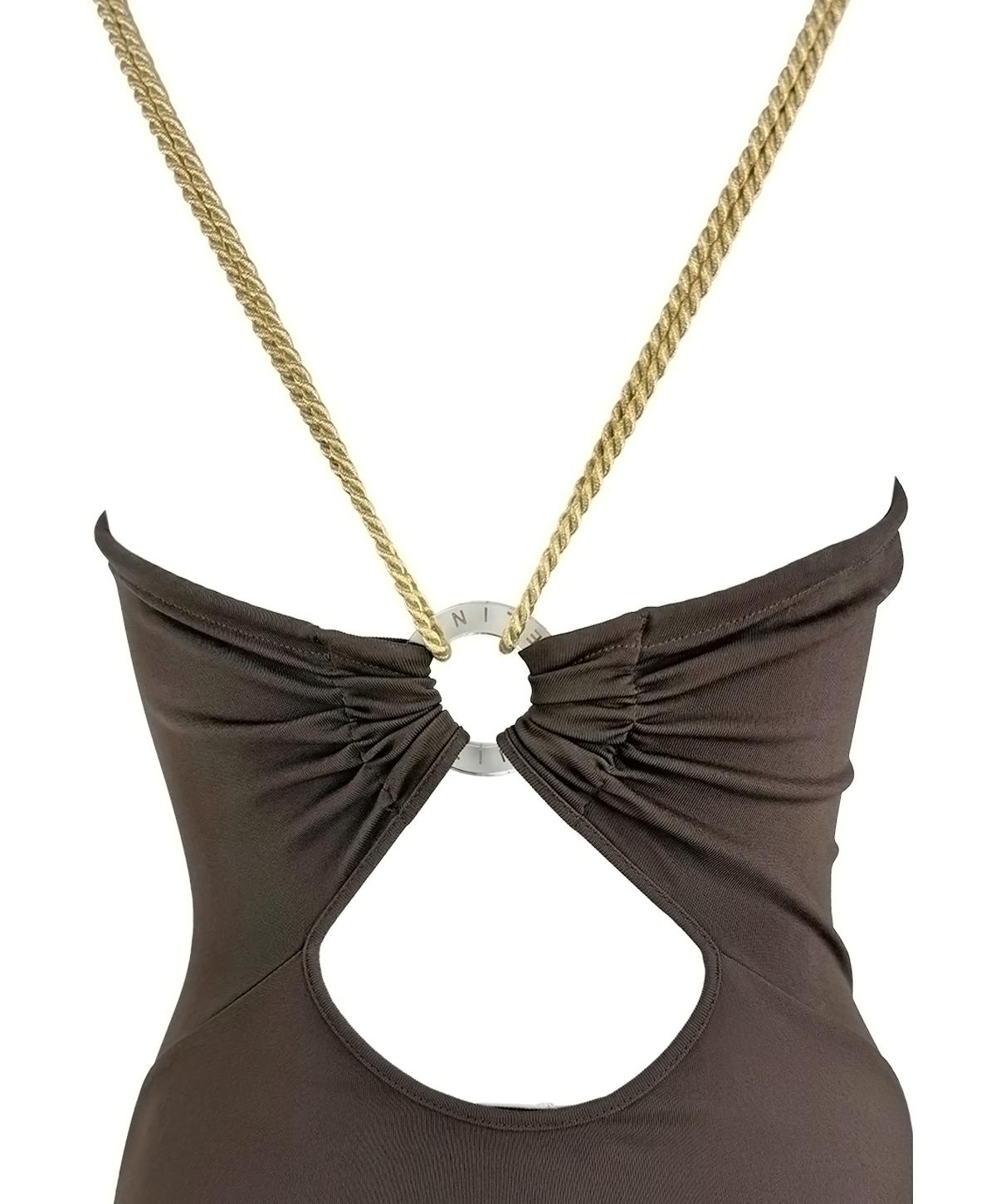 This 2000s Celine by Michael Kors bodycon dress is crafted from a fluid brown stretch fabric that hugs the body and falls to a midi-length hem. The minimalist front is balanced by a daring open back, framed with gold braided satin straps that