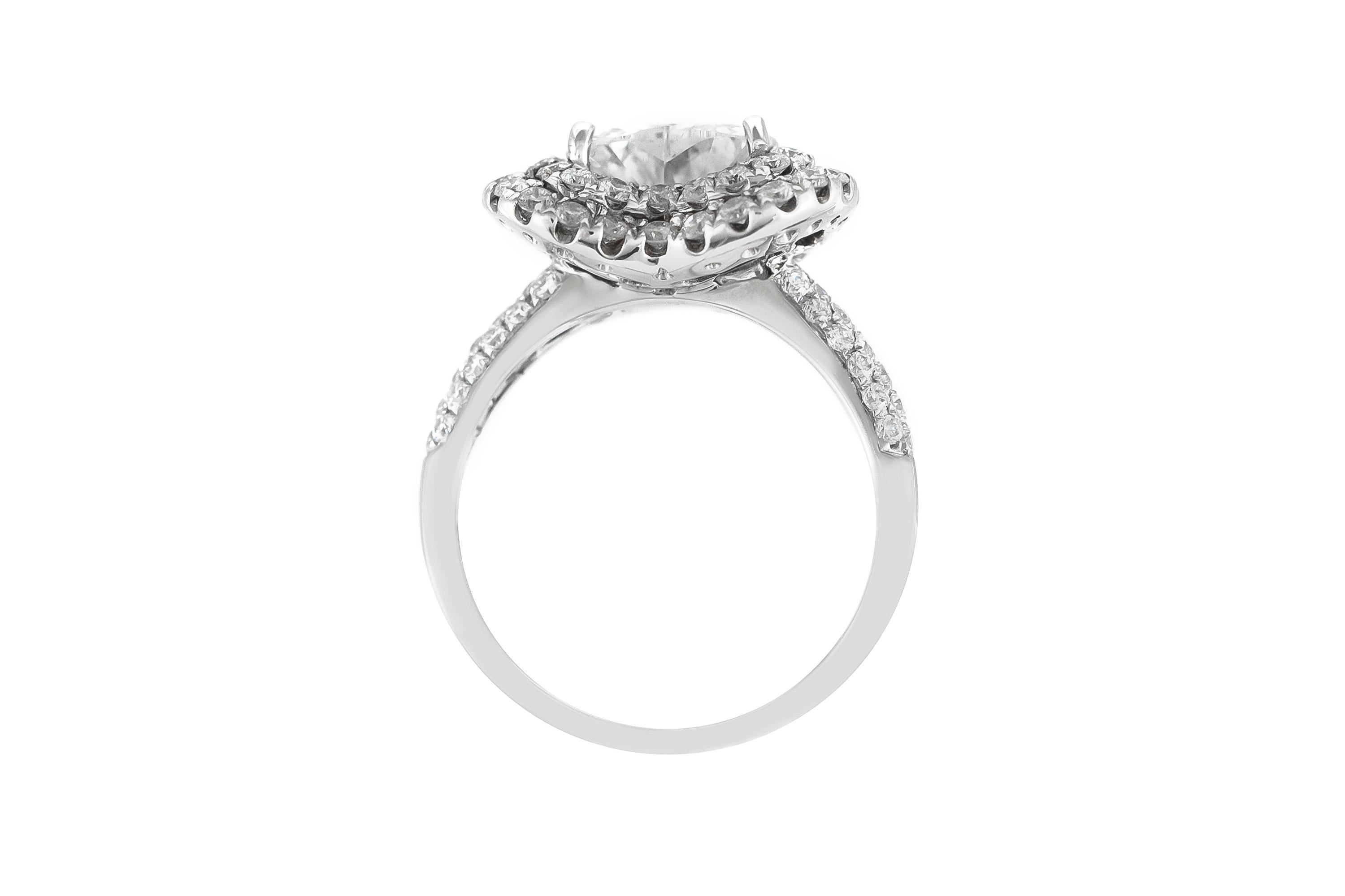 Finely crafted in 18k white gold with a heart cut center Diamond weighing approximately a total of 1.50 carats.
Color I, Clarity VS
The ring features round cut Diamonds weighing approximately a total of 1.40 carats.
Circa 2000s
Size 6 1/4, resizable