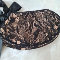 2000s Chanel Black Lace Clutch with Silk Ribbon