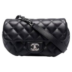 2000s Chanel black quilted leather small shoulder bag