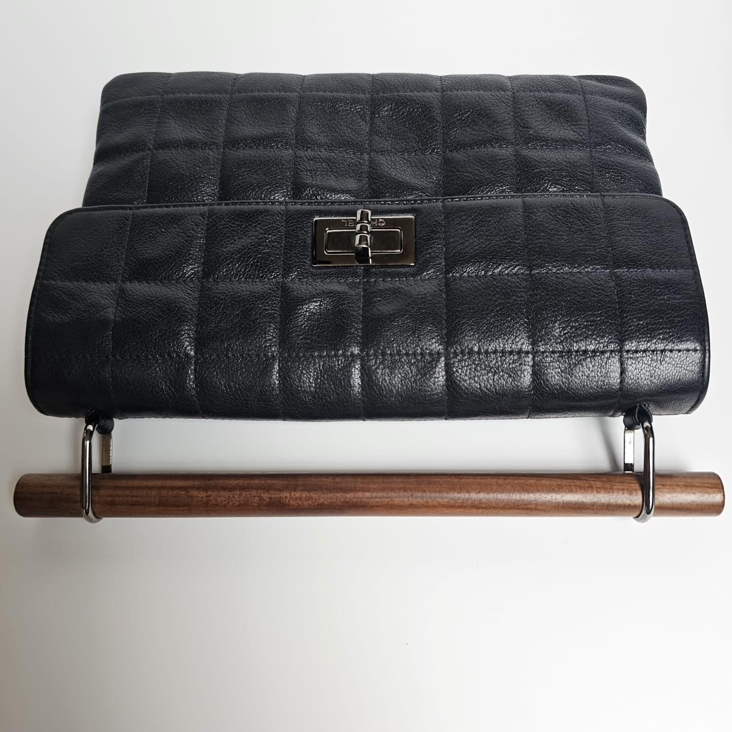 Women's or Men's 2000s Chanel Black Quilted Wooden Top Handle Reissue Clutch