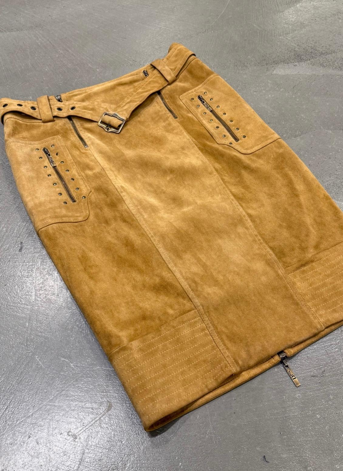 2000s Christian Dior by Galliano suede zipper skirt

This striking Christian Dior skirt from the early 2000s under John Galliano's creative direction is crafted from soft camel suede. It features a pencil silhouette with distinctive zipper details