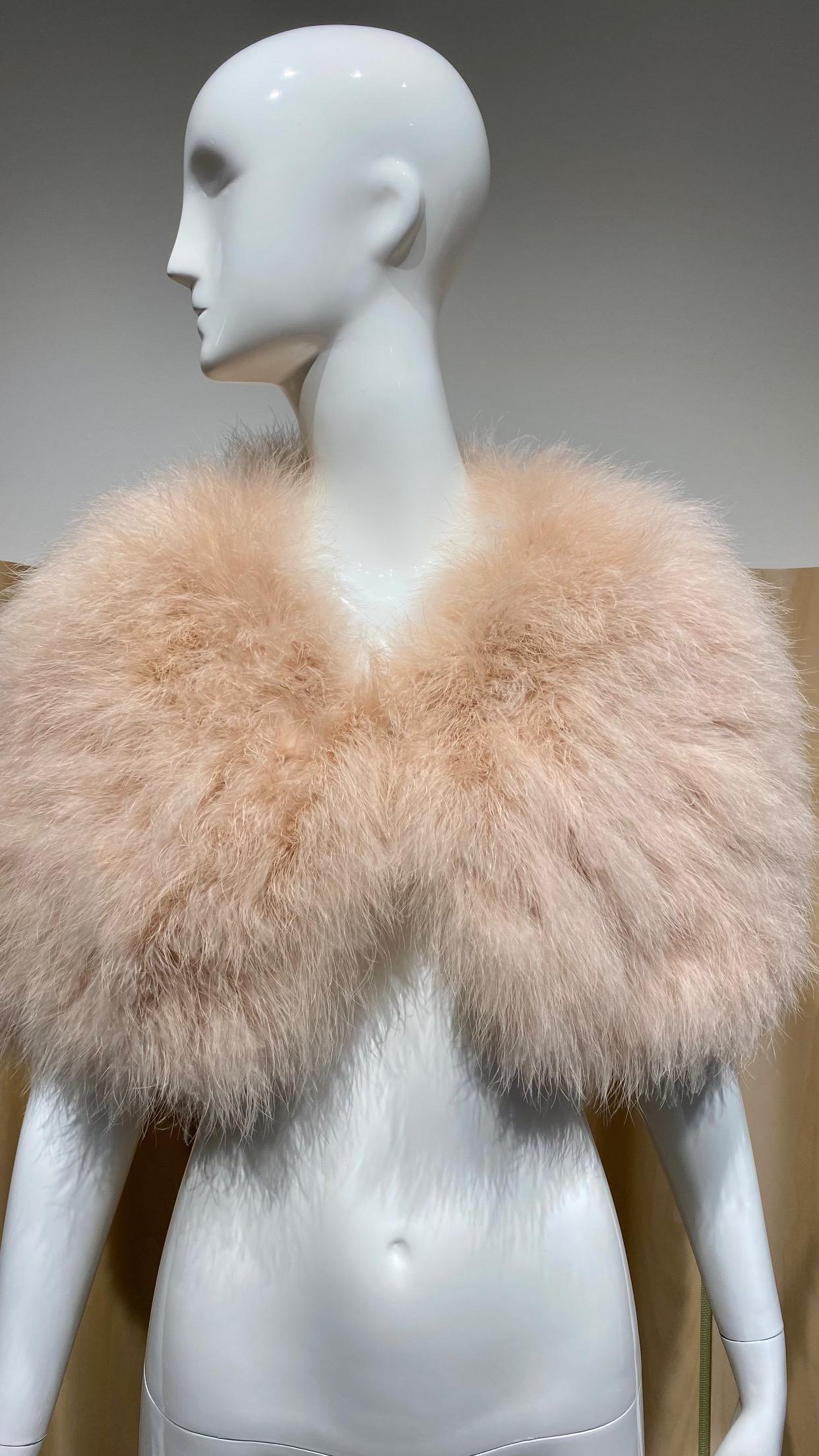 2000s Christian Dior by John Galliano Pale peach ostrich capelet ( closure with hook ) 
perfect for bridal or cocktail party.
Fit size US 2/4/6
Capelet lined in silk