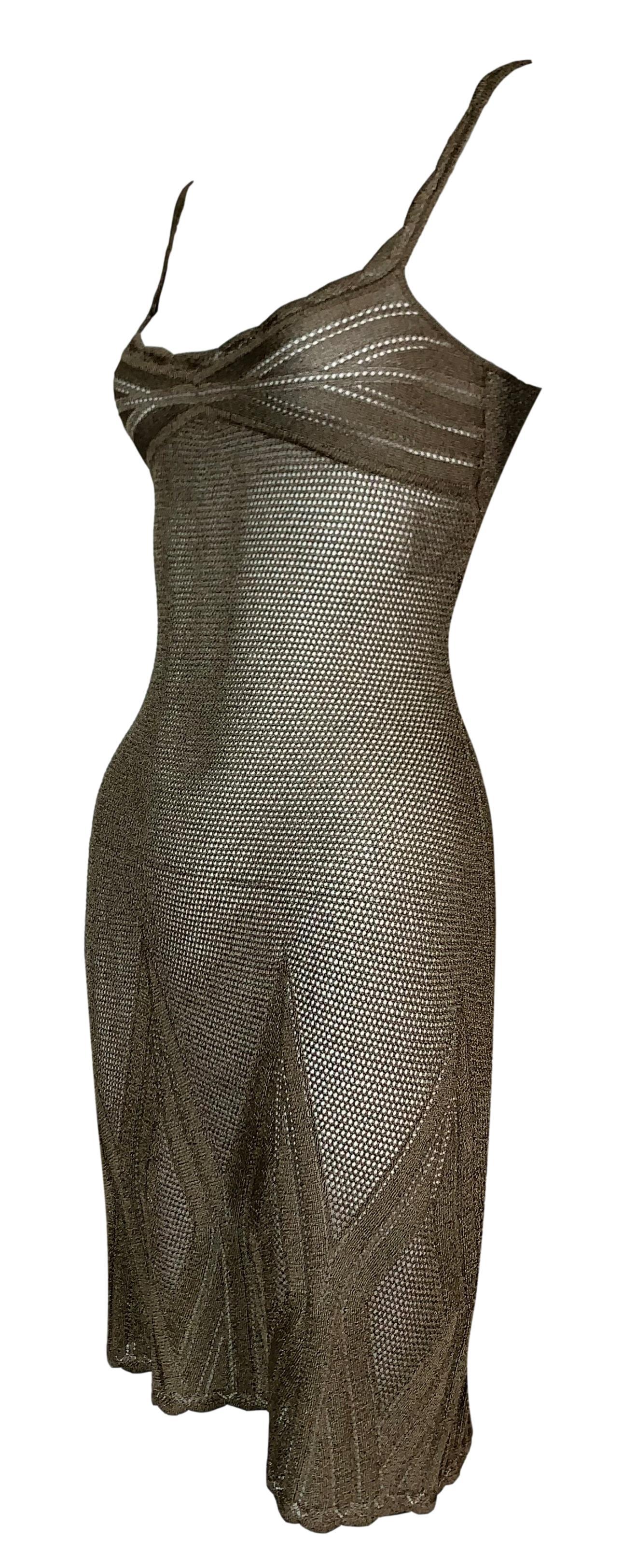 DESIGNER: 2000er Christian Dior von John Galliano

Bitte kontaktieren Sie uns für weitere Bilder oder Informationen

ZUSTAND: Gut - einwandfrei!

GEWEBE: Acetat-Metallic Polyester-Nylon

LAND: Italien

GRÖSSE: F-36 mit viel Stretch

MASSNAHMEN;