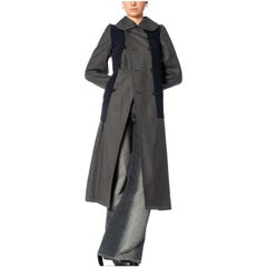 2000S COMME DES GARCONS Cappotto in lana grigia e marina con sovracopertura in polietilene striminzito 2007