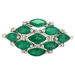 2000s Damas Jewelry Marquise Emerald and Diamond Ring in 18 Karat White Gold