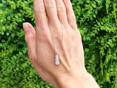 Contemporary Platinum 0.86ct Diamond Trilogy Pendant, Circa 2000