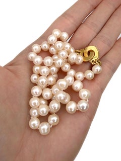 Anni 2000 – Collana con perle in oro 18 carati di Dinh Van Menottes