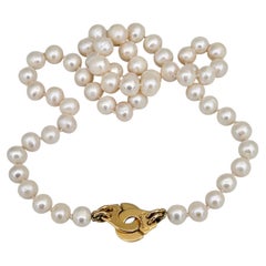 Anni 2000 – Collana con perle in oro 18 carati di Dinh Van Menottes