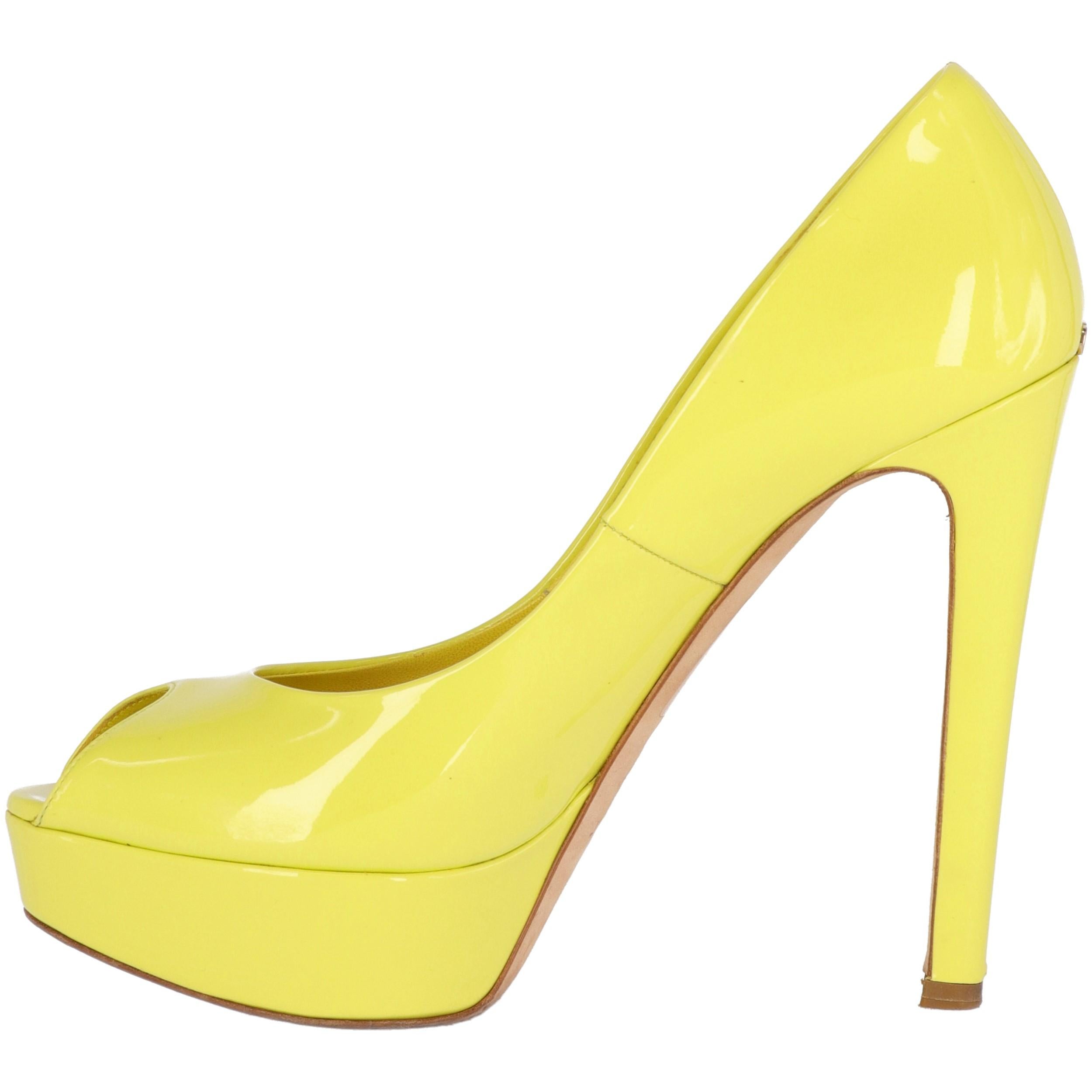 Dior heeled shoes in yellow lemon patent leather, with open toes, plateau, 13 cm heels, and golden metal 