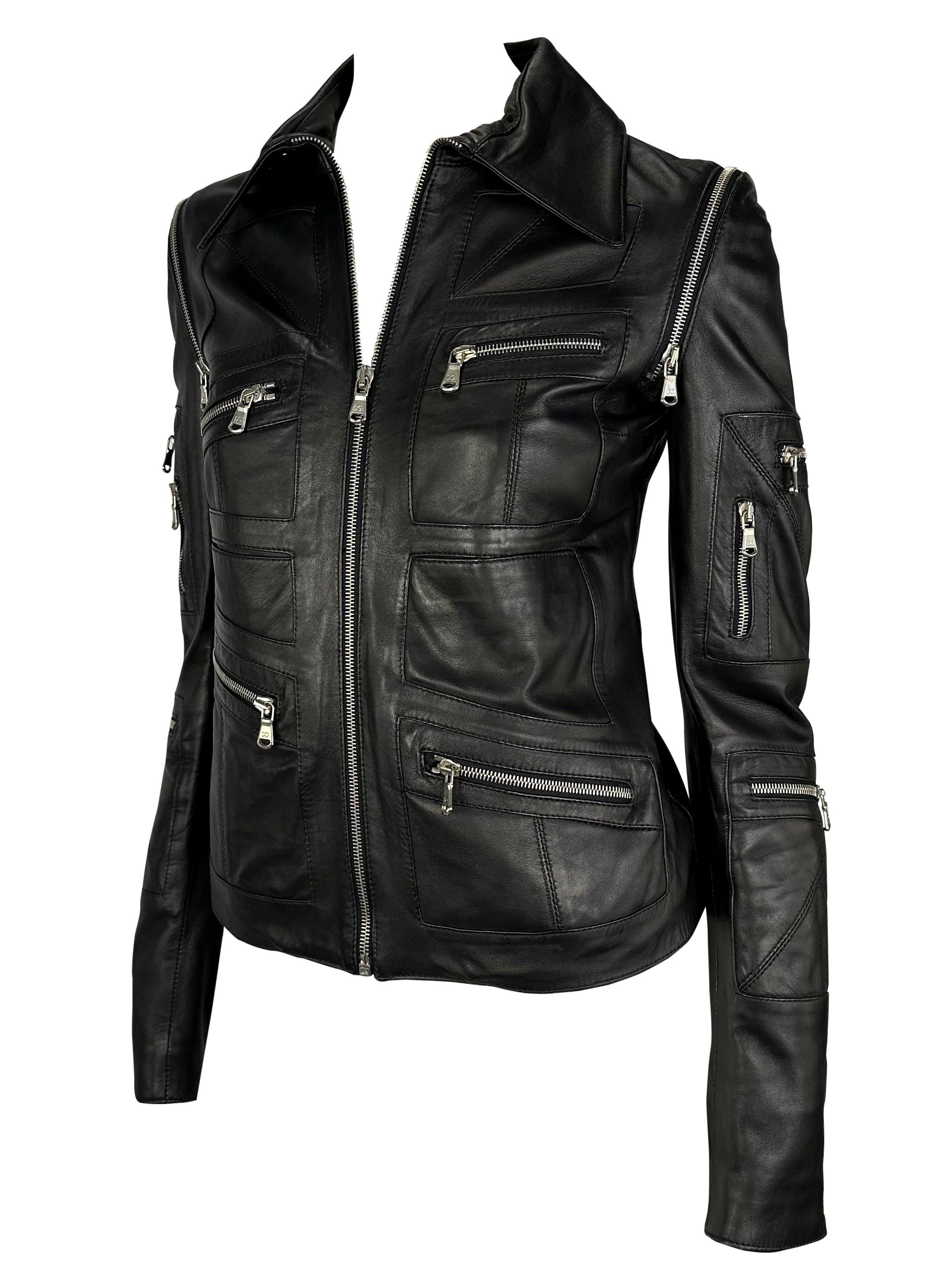 Presenting a fabulous black zipper Dolce and Gabbana leather moto jacket. From the early 2000s, this incredible jacket is covered in pockets and zippers. Every zipper on this biker chic jacket functions, including the zippers around the arms that