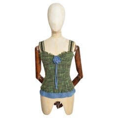 Dolce & Gabbana anni 2000: bustier a corsetto in pizzo e tweed verde con corpetto in denim