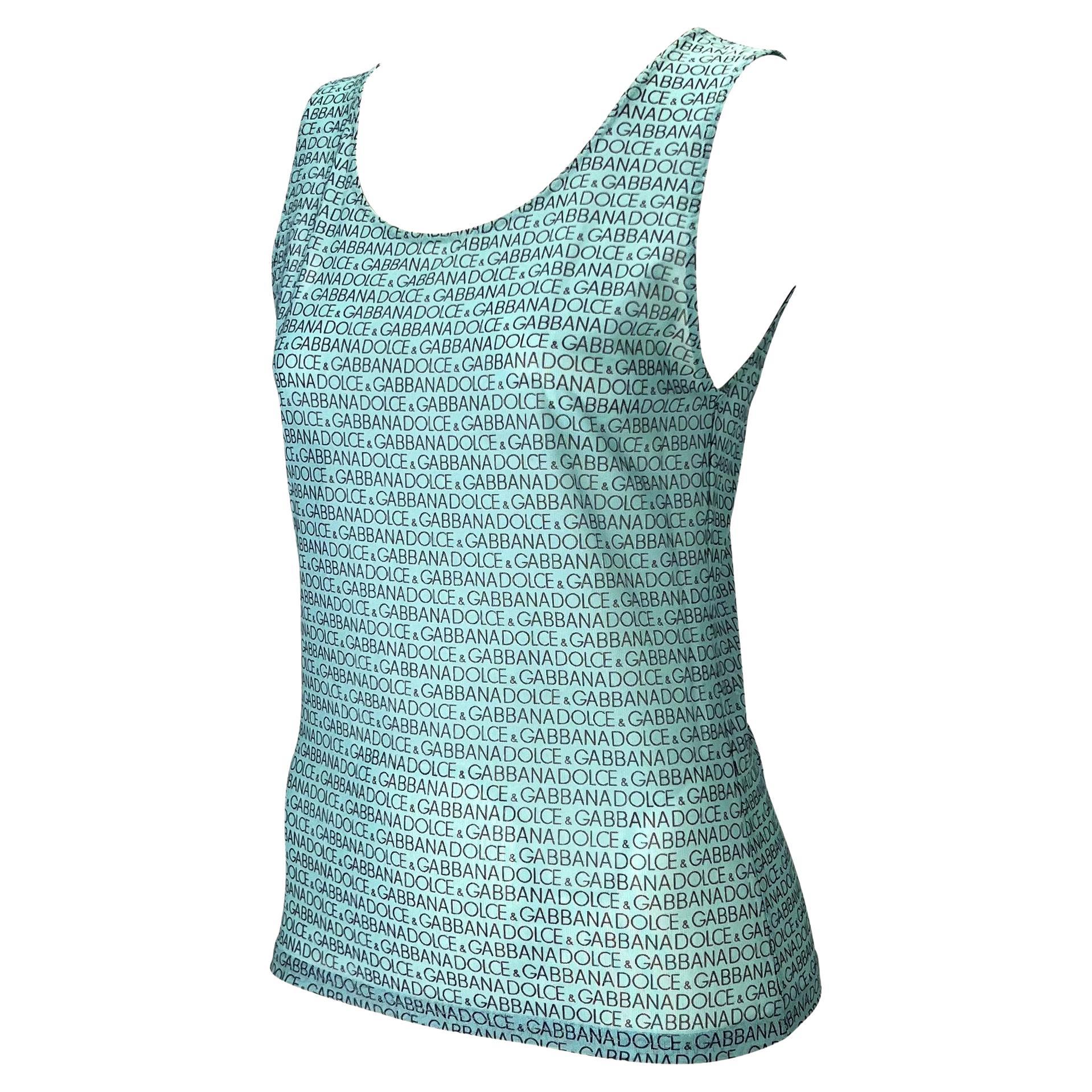 Presenting a sheer stretchy Dolce & Gabbana mare logo print sleeveless blouse from the early 2000s. This teal Y2K piece features the logo print that debuted in the Spring/Summer 1995 season in black and white.

Approximate measurements:
2