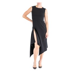 2000S DONNA KARAN Robe moderniste en laine stretch noire avec fentes latérales hautes