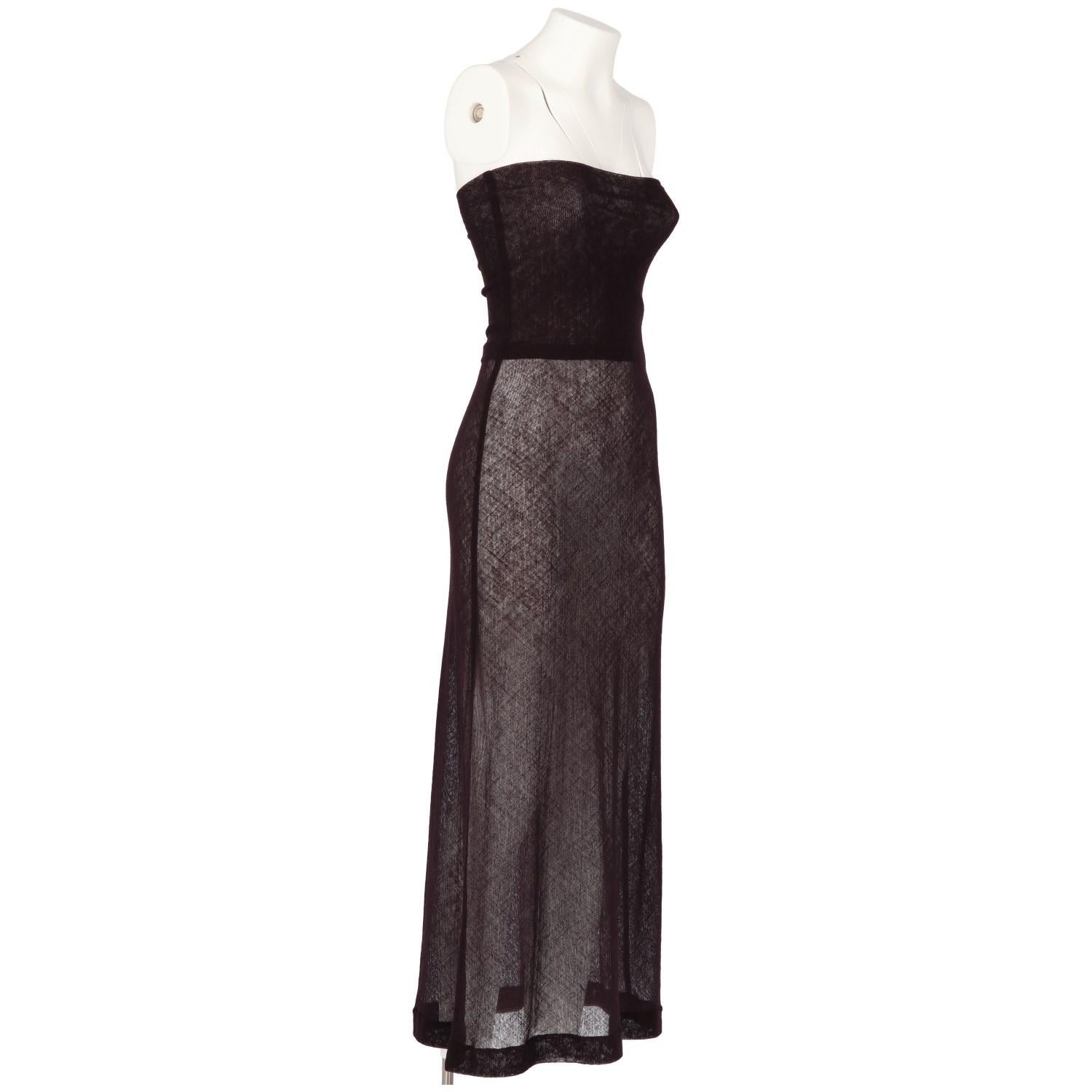 Dries Van Noten slight sleeveless dress in super subtle stretch-wool knit, see-through effect. It comes in a beautiful dark purple color, almost black. The item is in excellent conditions. 

Size: 38 EU

Height: 120
Bust: 35 cm
Waist: 30 cm