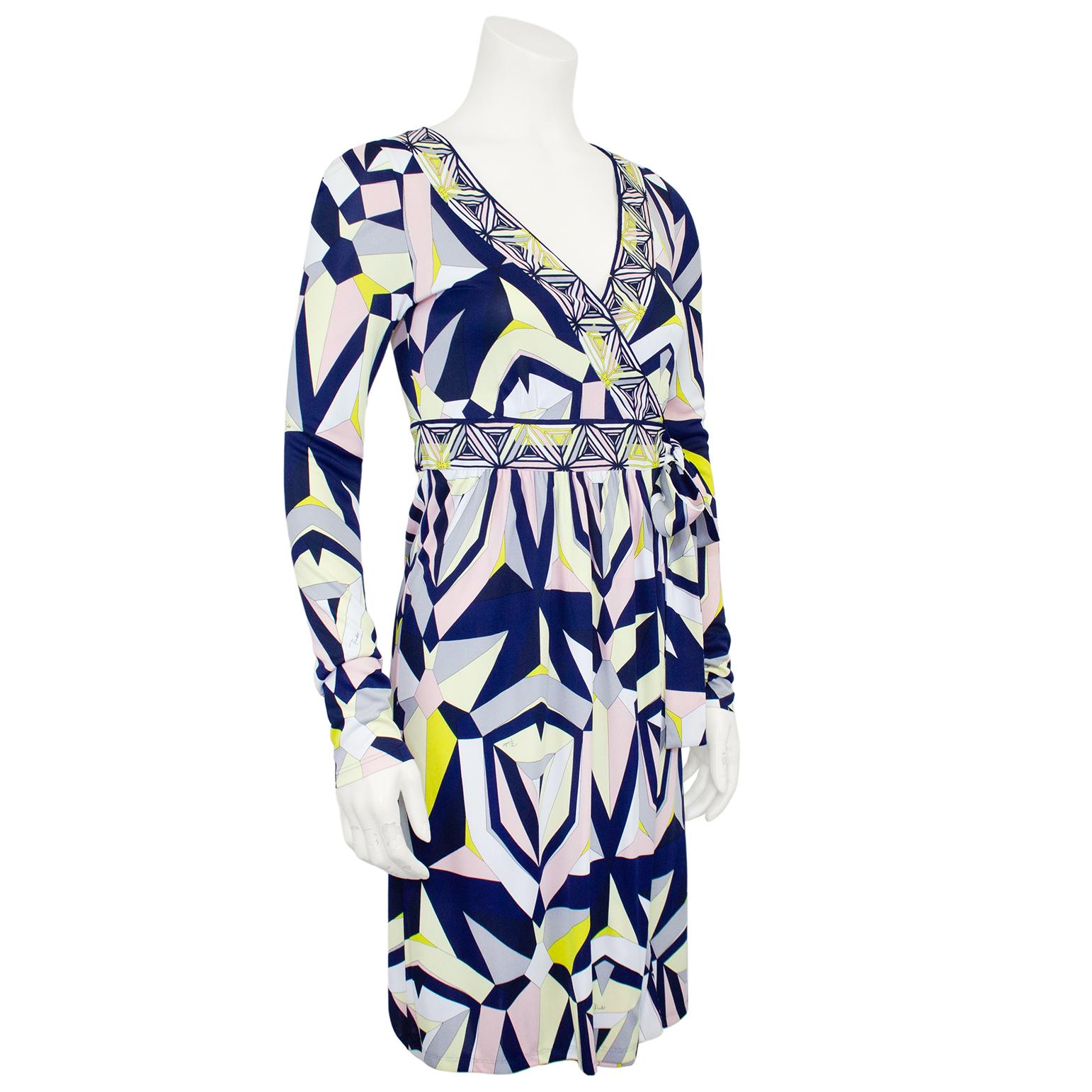 Mid 2000s Emilio Pucci printed wrap style dress. Ties on the left at the waist. V neckline and long sleeves. In excellent condition. Fits a US 4/6.