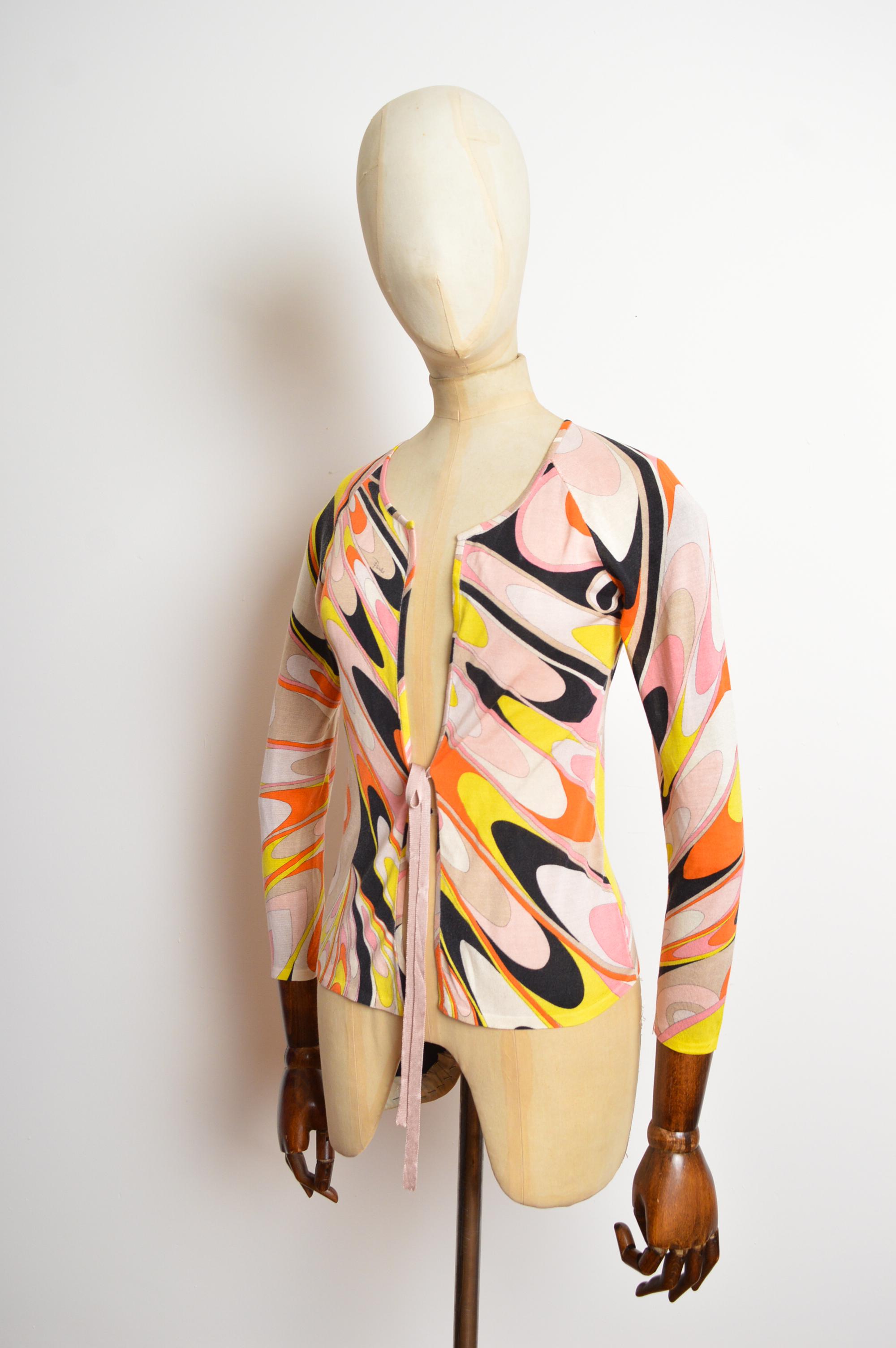 Fabulous Emilio Pucci set circa 2000 comparing a fine knit long sleeves cardigan and spaghetti strap tank top vest. 
Size; No interior Label / We recommend Size Small / Medium (U.K. 6-8) 
Measurements are provided in inches (‘’)
Pit to Pit; 17”
Pit