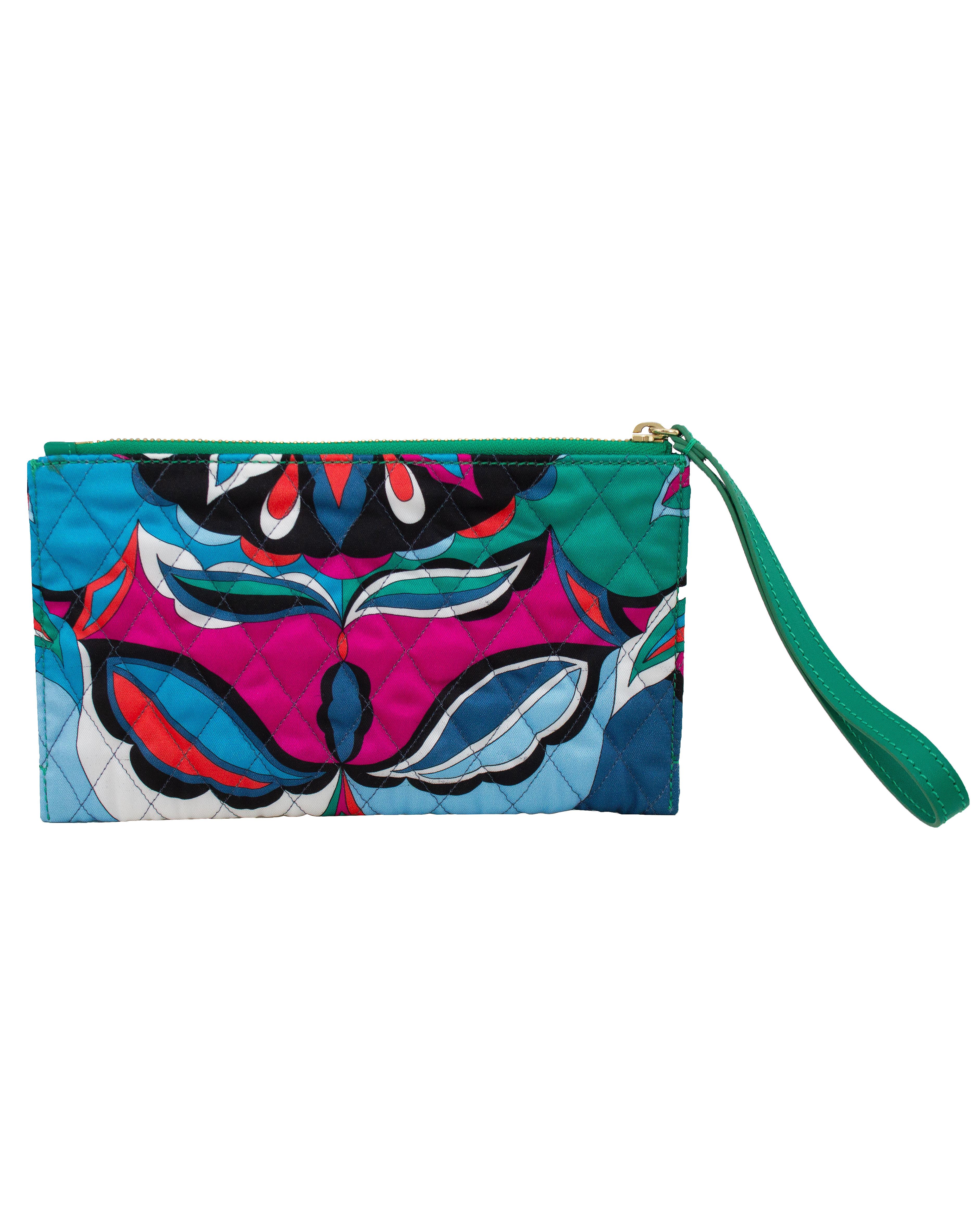 Emilio Pucci wristlet pouch from the mid 2000s. Multi colour abstract silk with diamond shaped top stitching creating quilting. Emerald green wrist strap and trim with contrasting gold top zipper. Interior is like a wallet with card and cash slots.