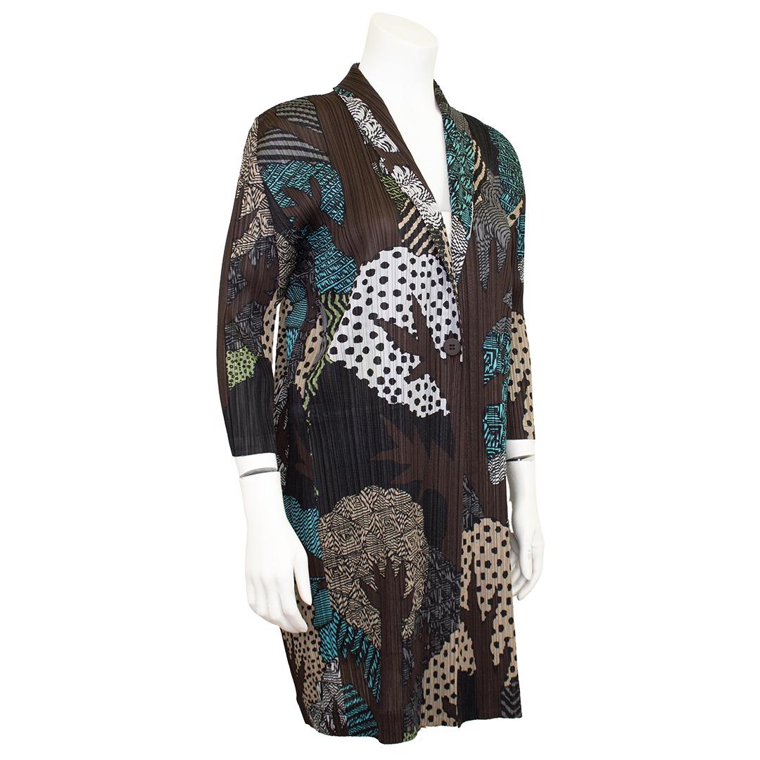 Forest Woods Pleats Please pattern Issey Miyake polyester long cardigan from the 2000's era. The timeless appeal of the Pleats Please brand is why it has been a staple in every closet regardless of ones age. There are so many ways to use this