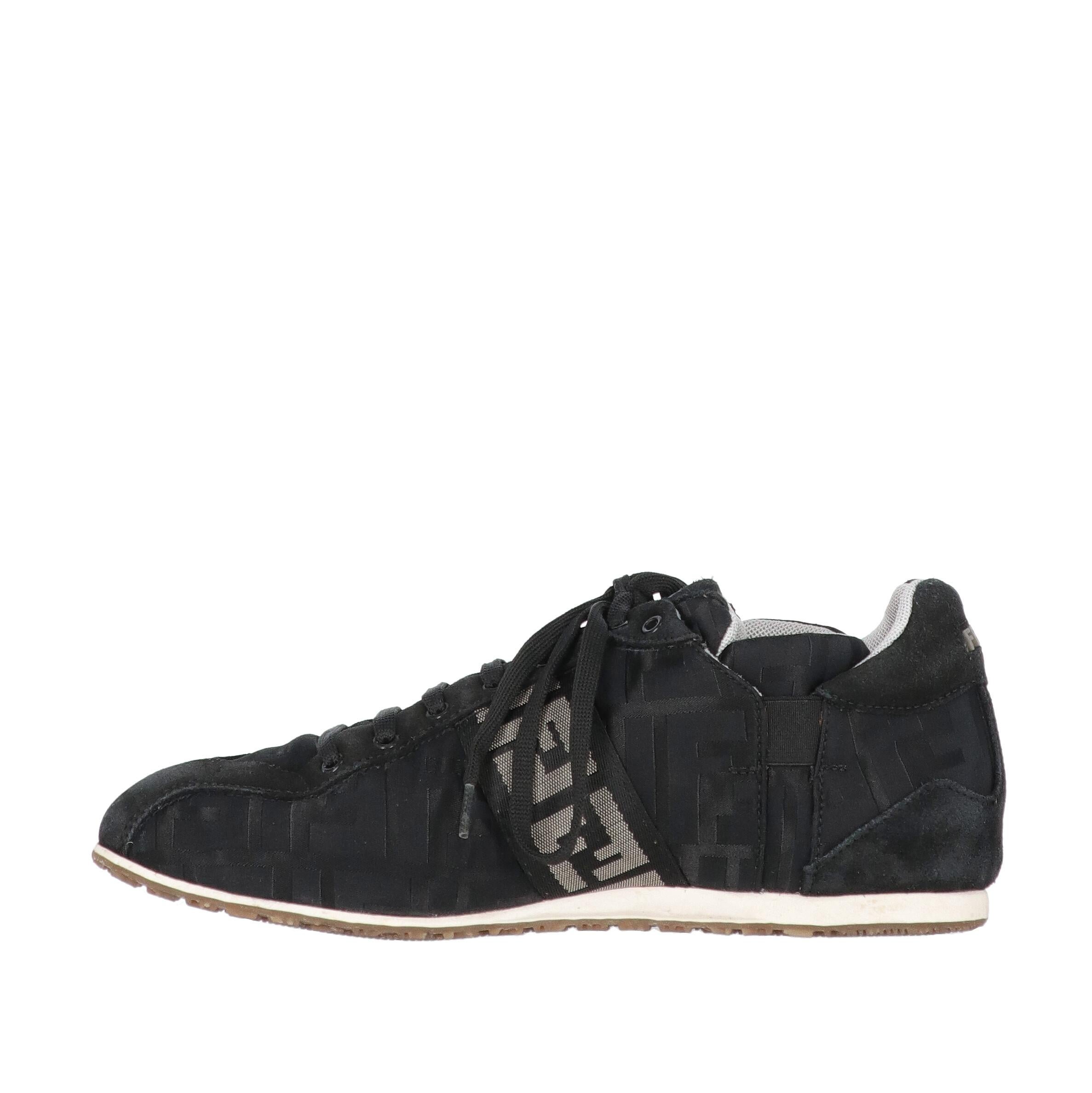 Fendi black monogram pumpkin fabric lace-up shoes with suede details. Round toe, two side logoed bands and rubber sole.
The shoes show signs of wear on the suede and the sole, as shown in the pictures.

Years: 2000s

Made in Italy
Size: 37
