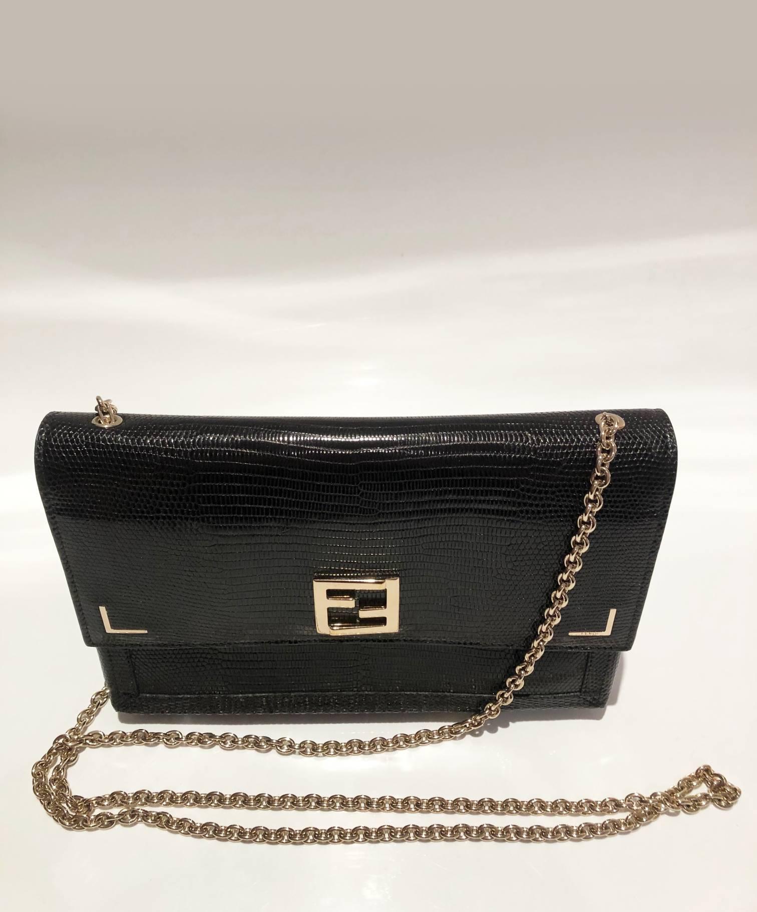 FREE UK and WORLDWIDE DELIVERY 
FENDI lizard print black leather shoulder bag featuring FF logo and metal-ware details on side, silver-tone chain, 6 internal compartments, one zipped interior pocket, flap clutch closure, made in Italy. It comes with