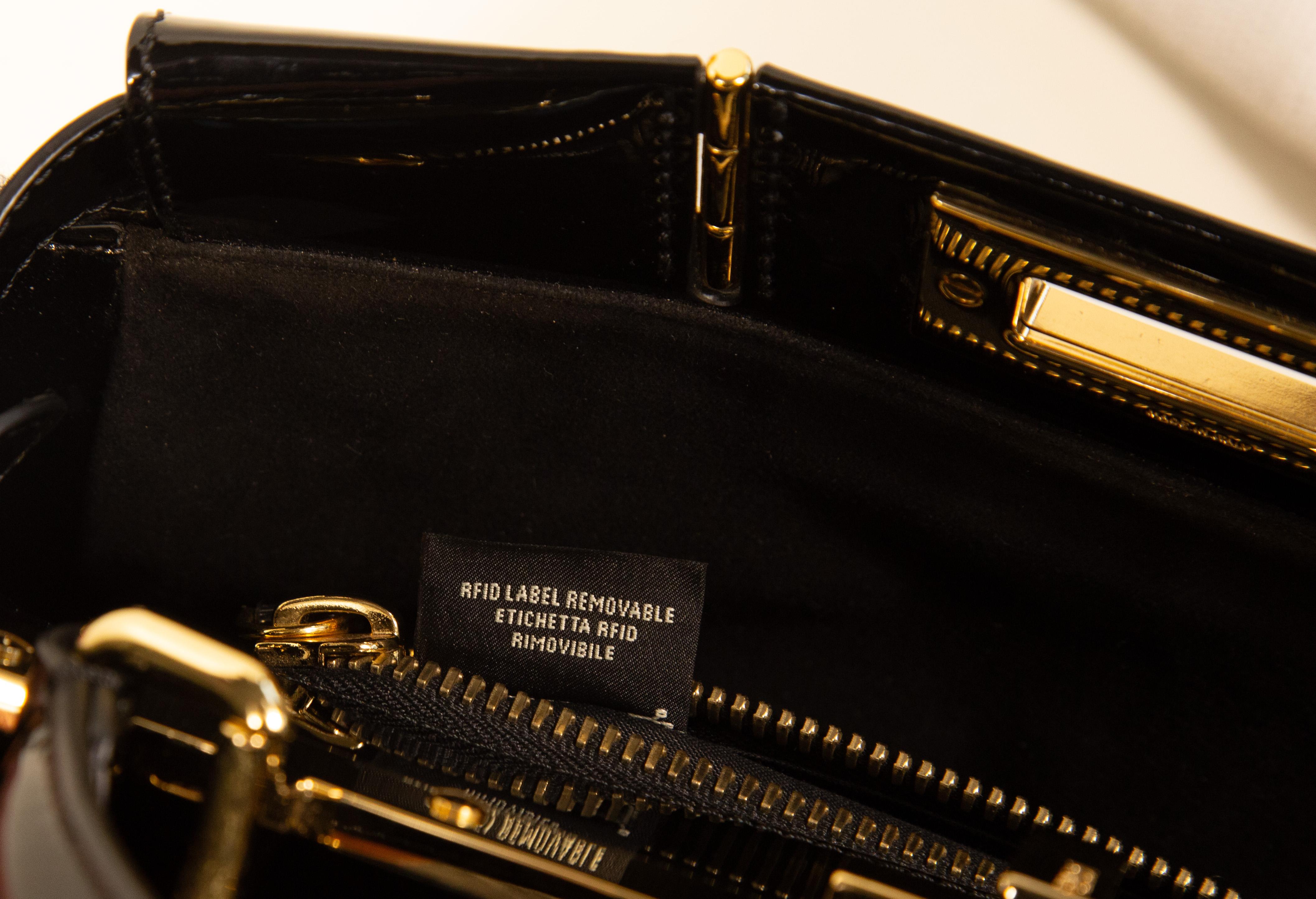 2000s Fendi Peekaboo Shearling Pequin Tobacco Black 2 Way Bag For Sale 10