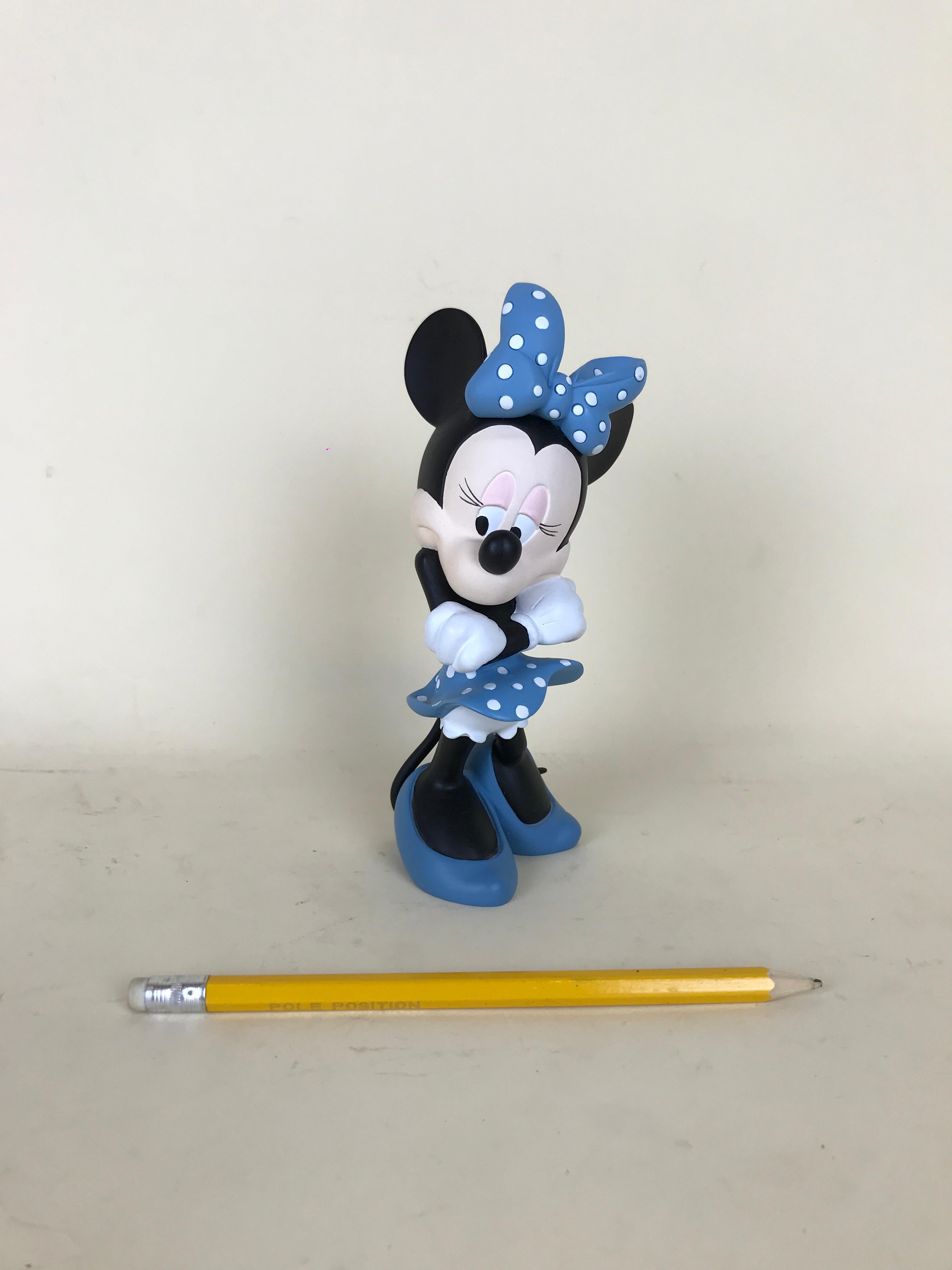 Walt Disney Minnie Mouse statue by French company Demons & Merveilles for Walt Disney realized in resin in the 2000s.

The statue doesn't have the original box.